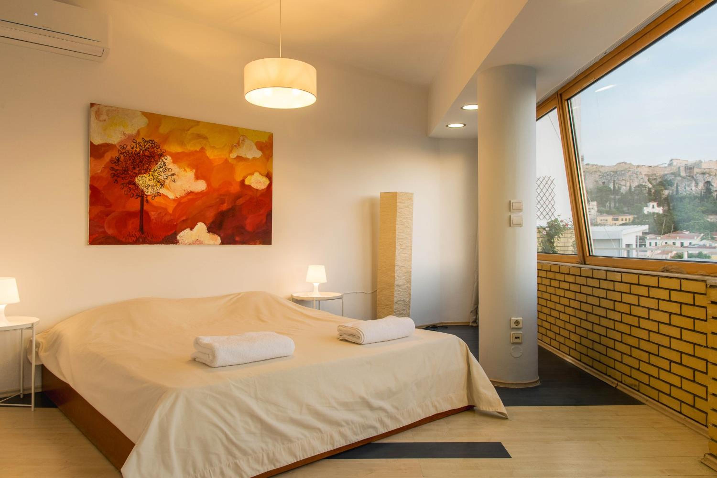 Urban loft with balcony across the Acropolis!