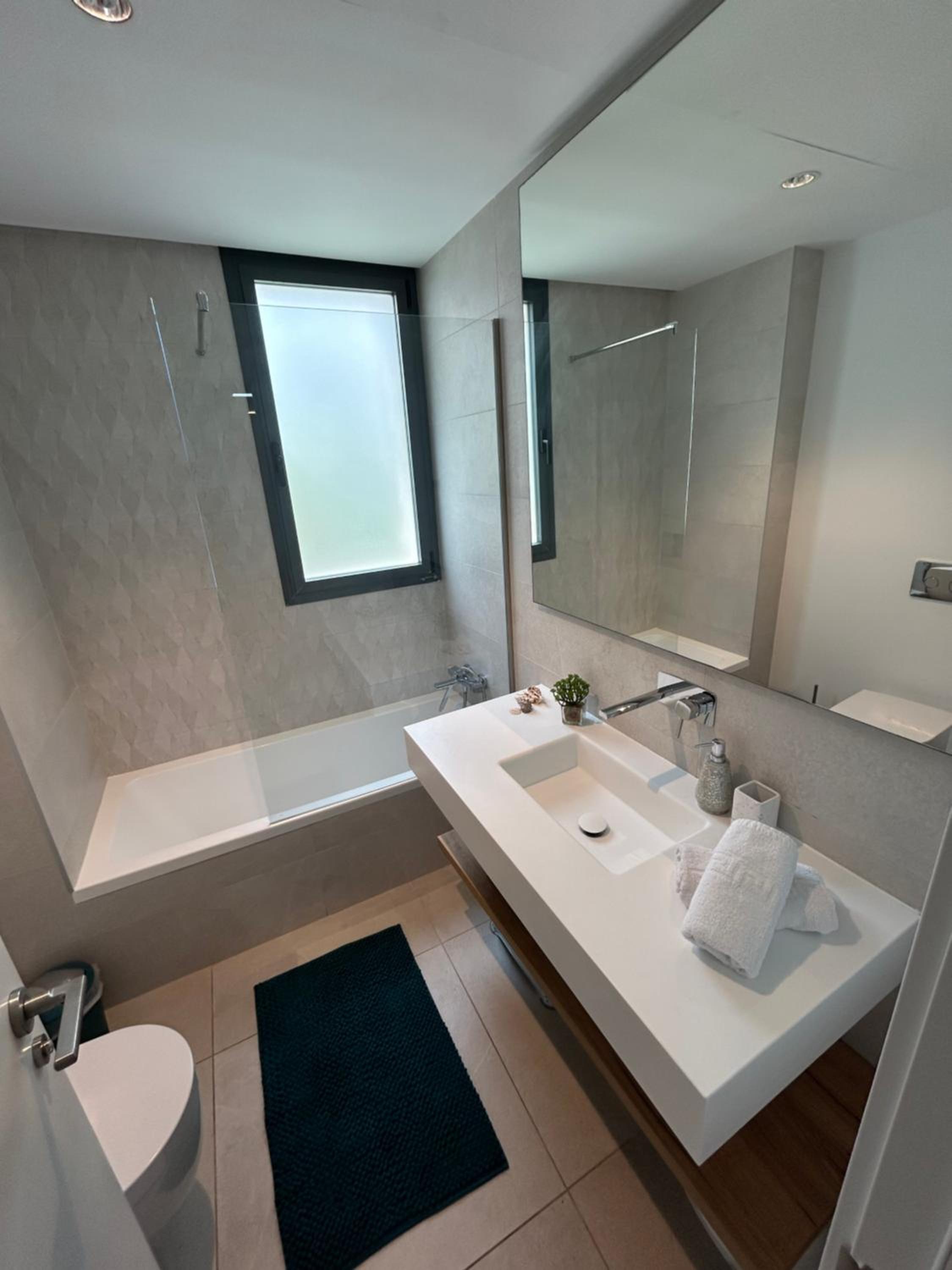 Apartamento con jardin en Cabopino Artola Homes