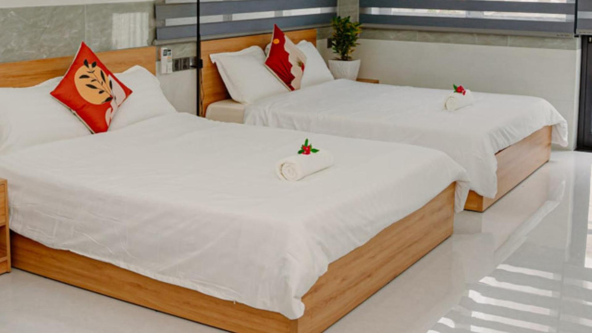 ALOHA SAIGON PREMIUM HOSTEL by Local Travel Experts - Newly opened, Less-touristy location, Spacious rooms, Glass shower bathroom, Free breakfast & Walking