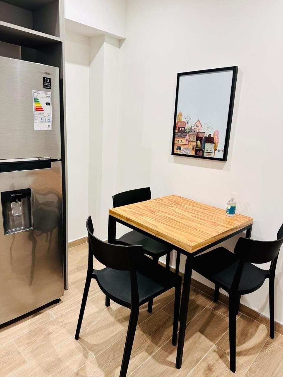 Aunaisin - Apartamentos 9 de julio 52
