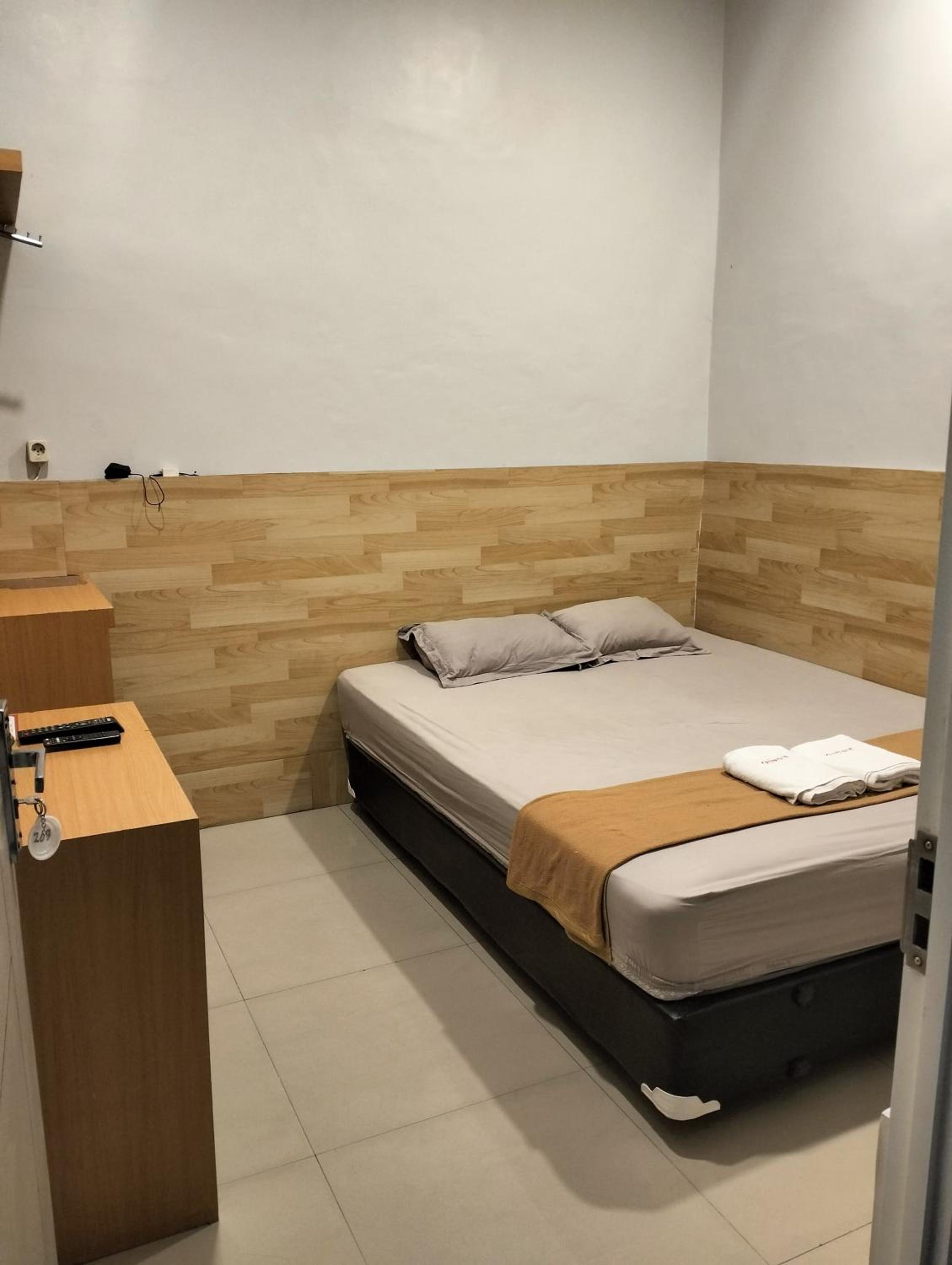 Cozy Guest House Osborn Malang view 4