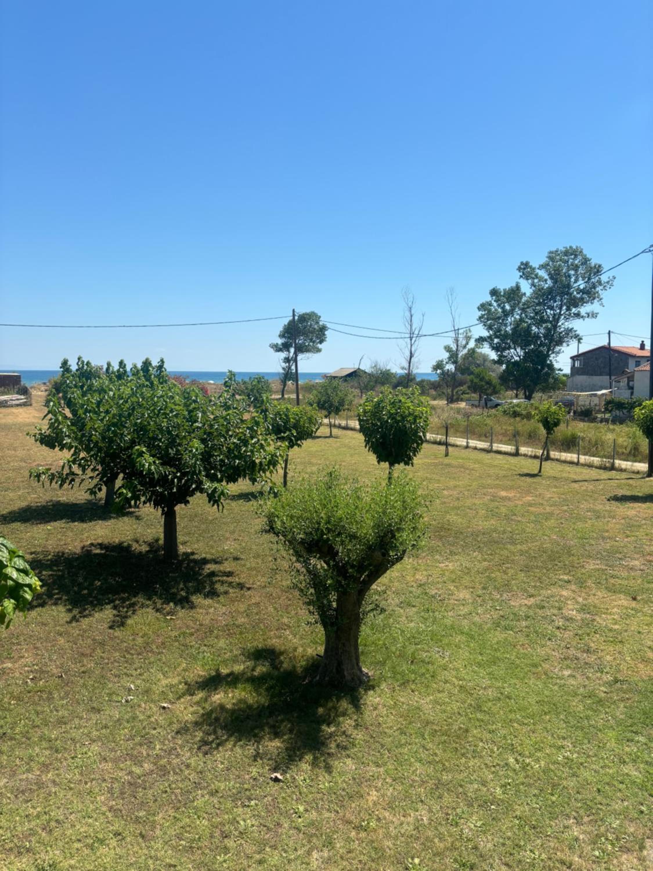 Sapphire Apartment , Beachfront Family Apartment for 4 with Private Garden, 1-Minute Walk to the Beach