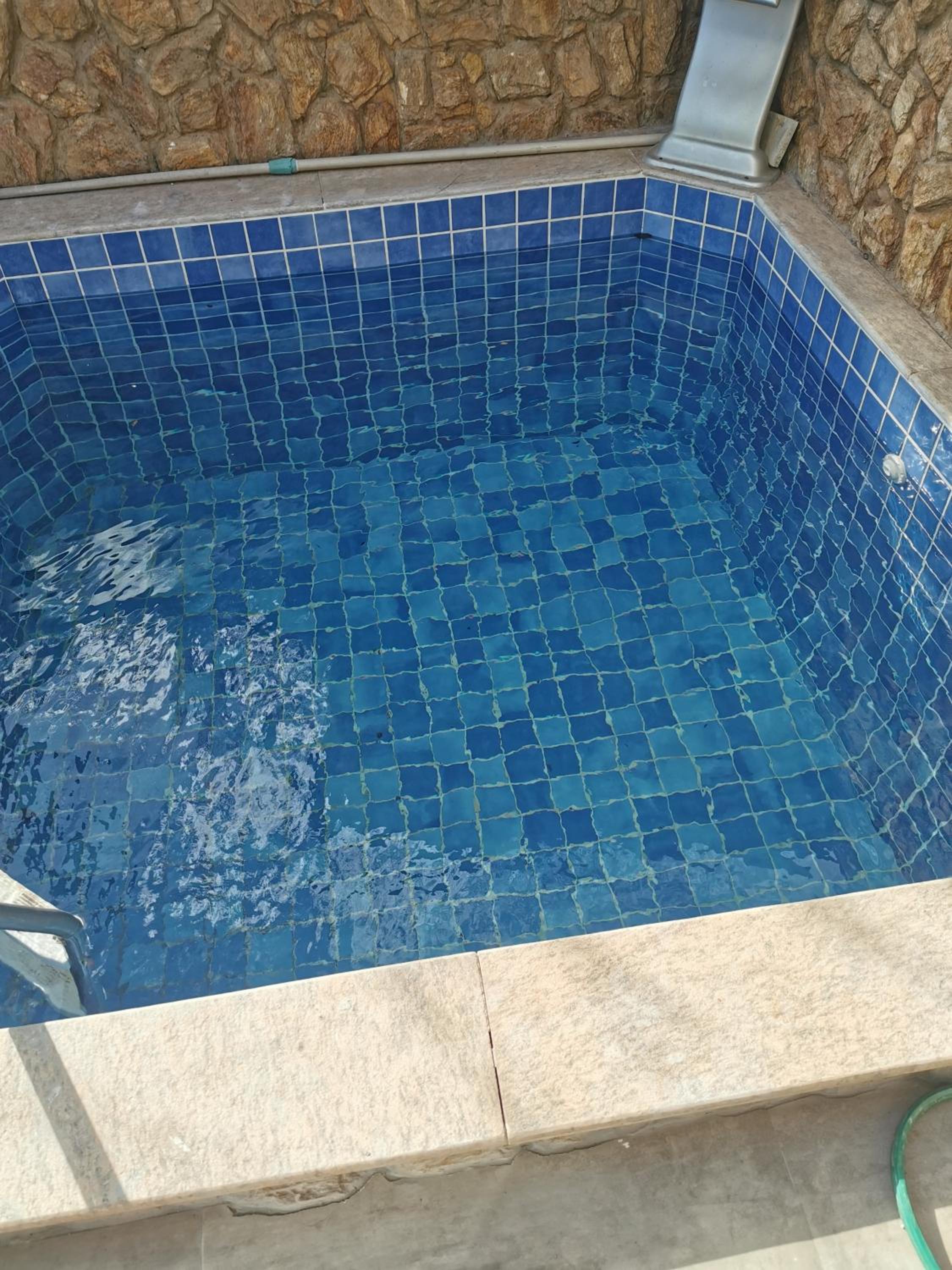 Casa Azul na Praia do Verão Vermelho