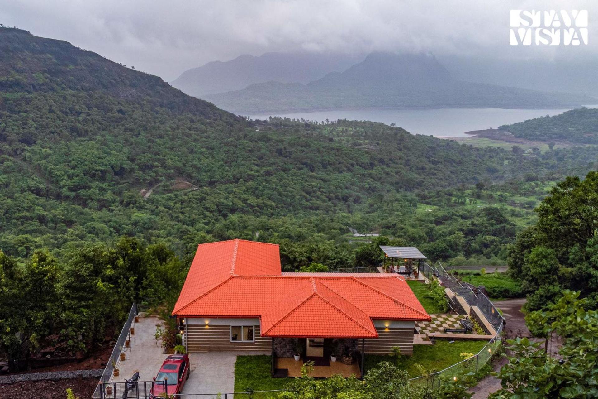 Waterfront Villa with Infinity Pool & BBQ Grill at Pune by StayVista view 2