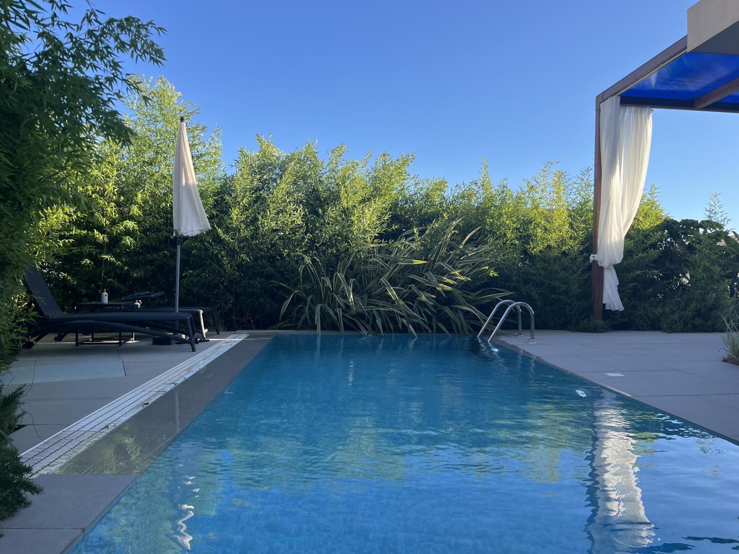 Green Coast beach villa with pool, hot tub & sauna