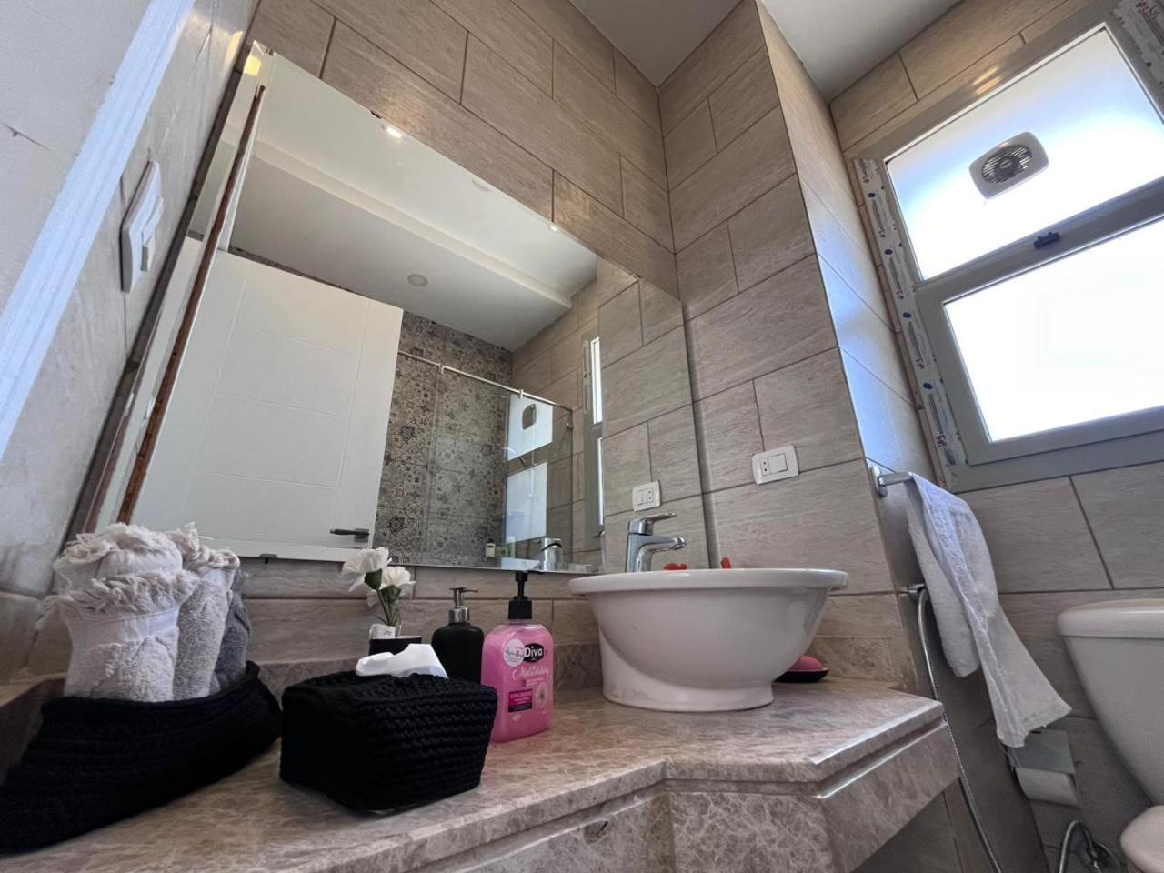 Village gate- new cairo- studio-Palm Hills