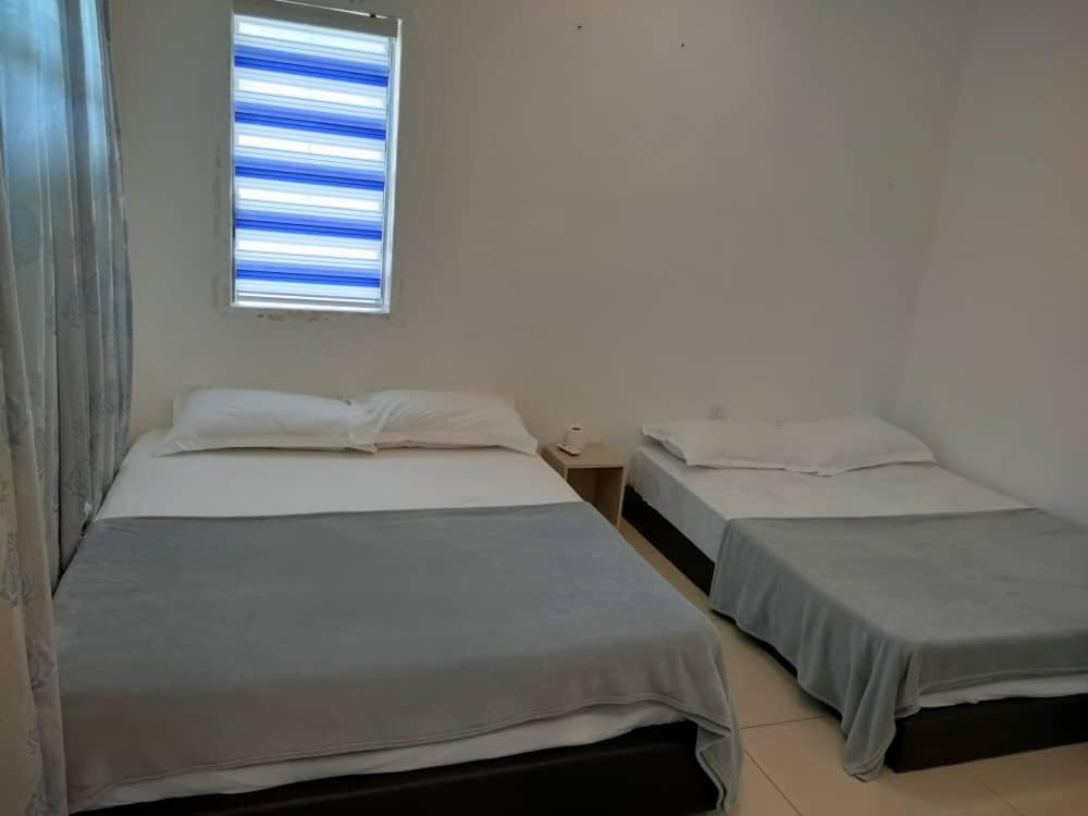 Tanjung bungah double story house for 18 people photo 2