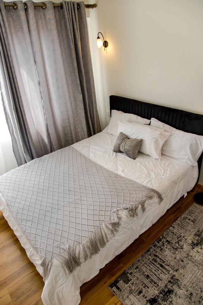 Calm Place at Mi Vida garden city -2 bedroom view 5