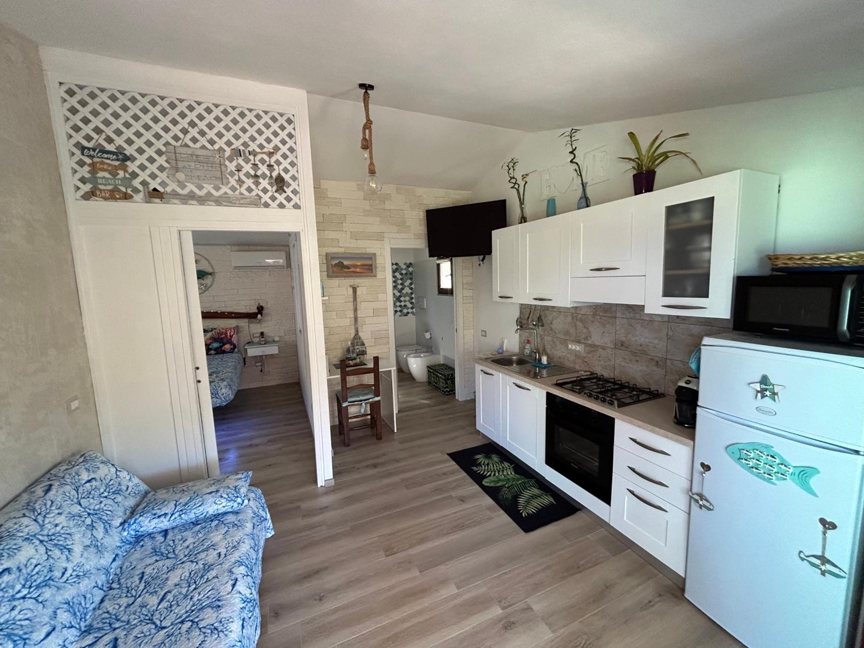 Oasi del Relax - Seaside Peaceful Panoramic Terrace in ITALY - new Sardinia apartment 50 mt beach&sea full comfort air conditioning-WiFi-Parking-Privacy