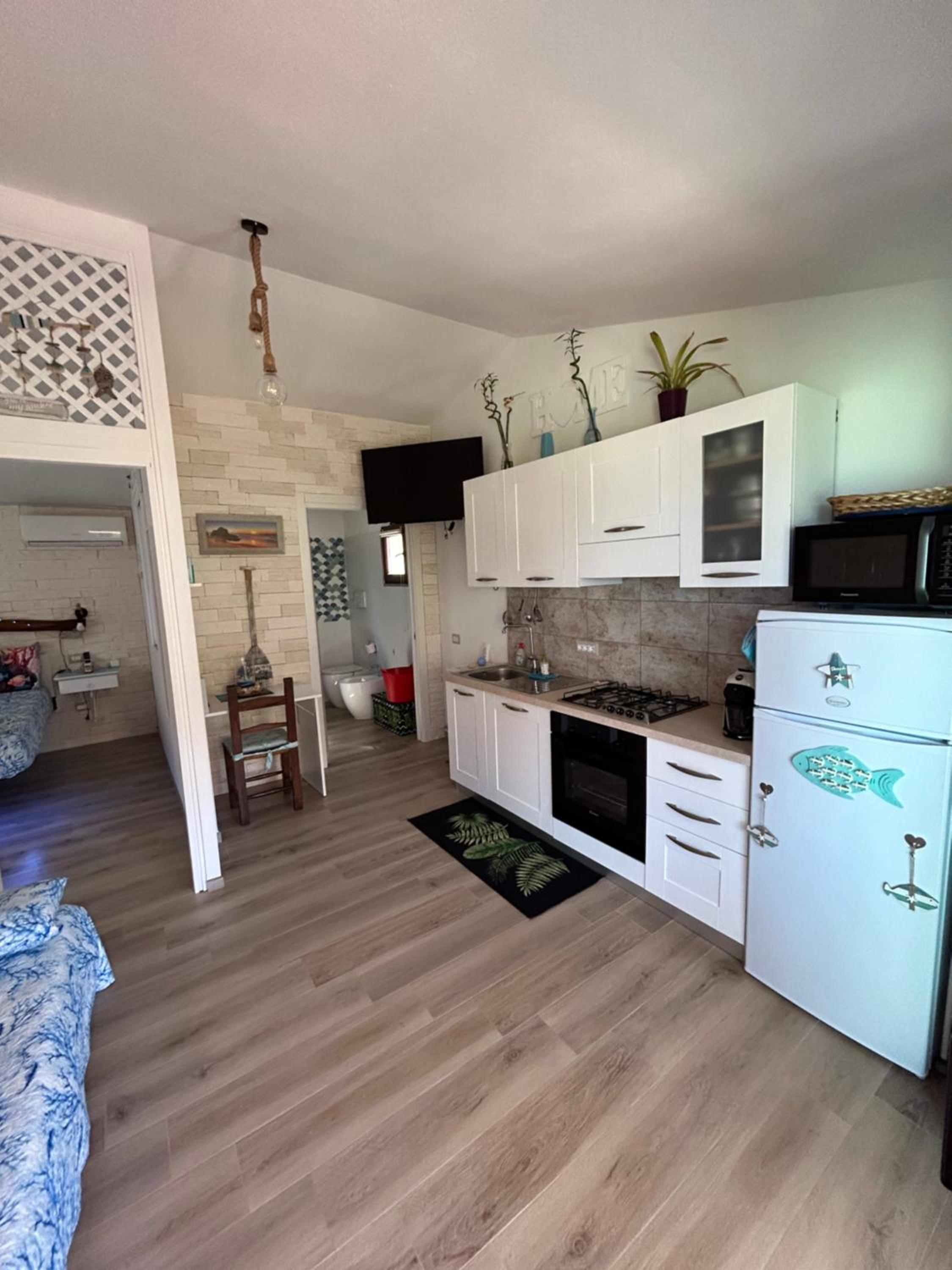 Oasi del Relax - Seaside Peaceful Panoramic Terrace in ITALY - new Sardinia apartment 50 mt beach&sea full comfort air conditioning-WiFi-Parking-Privacy