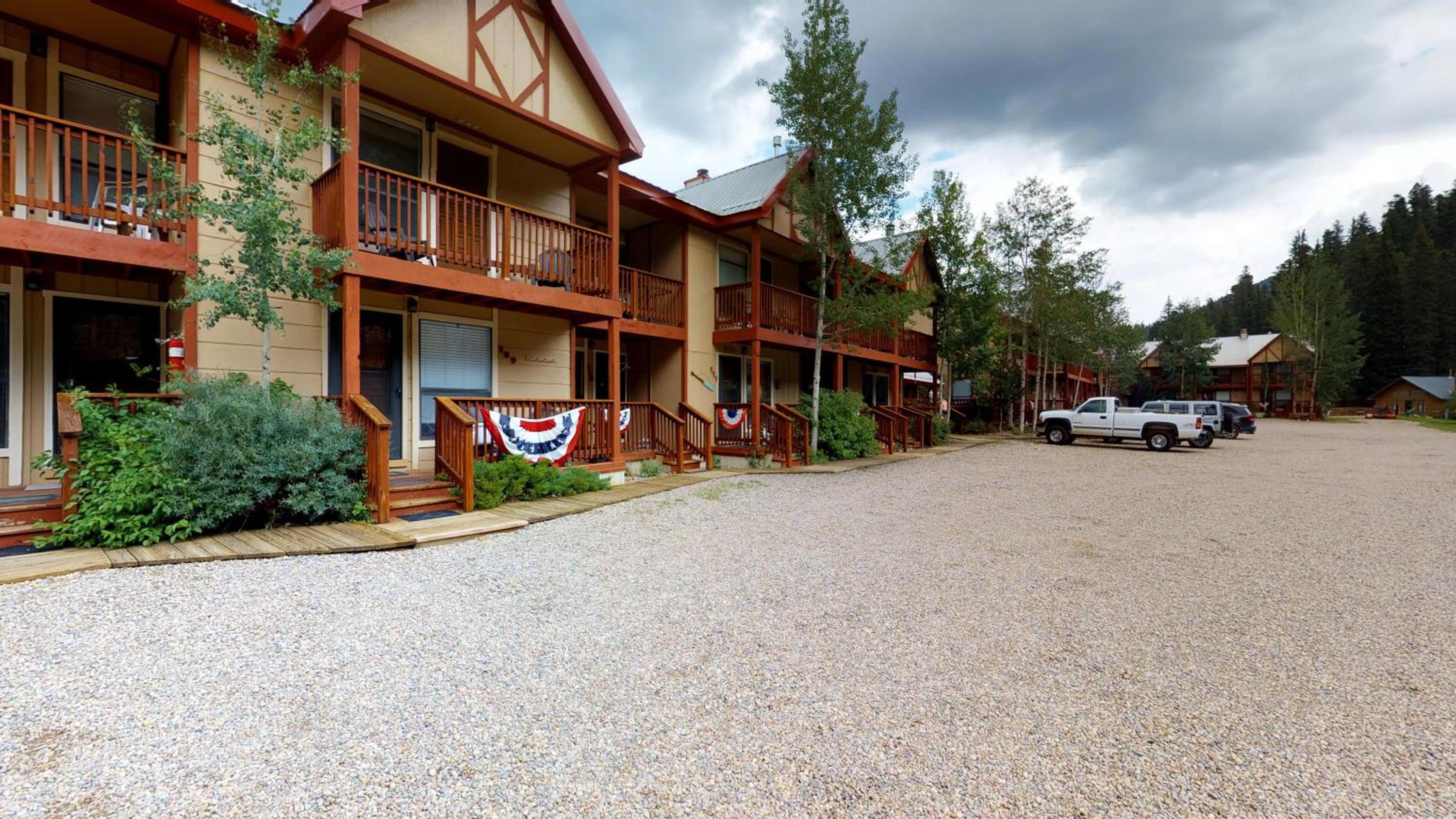 Valley Condo 111 - Dancing Bear Retreat - Creekside - WiFi - Hot Tub - Fireplace - Washer - Dryer - Playground view 3