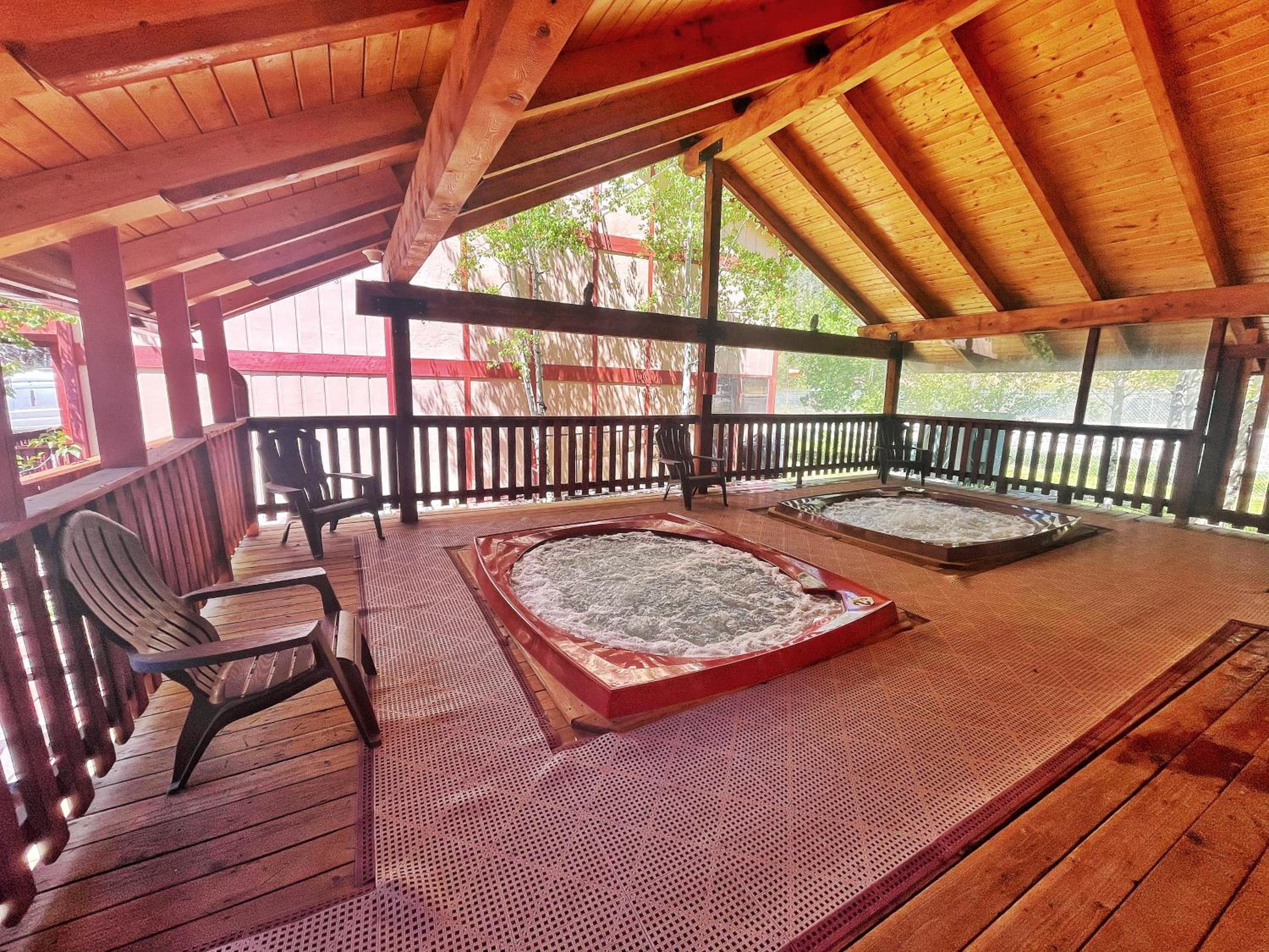 Valley Condo 111 - Dancing Bear Retreat - Creekside - WiFi - Hot Tub - Fireplace - Washer - Dryer - Playground view 4