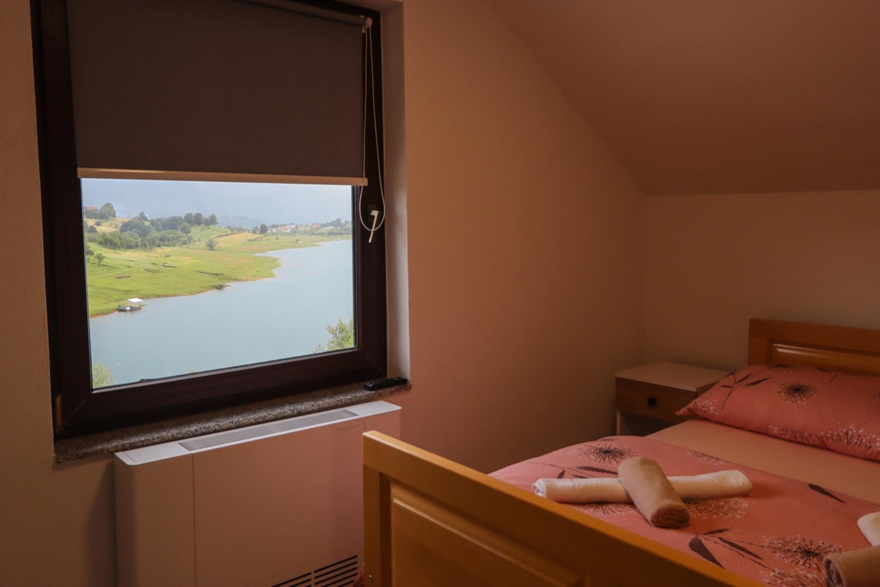 Tadic apartments and rooms by the shore of Rama Lake