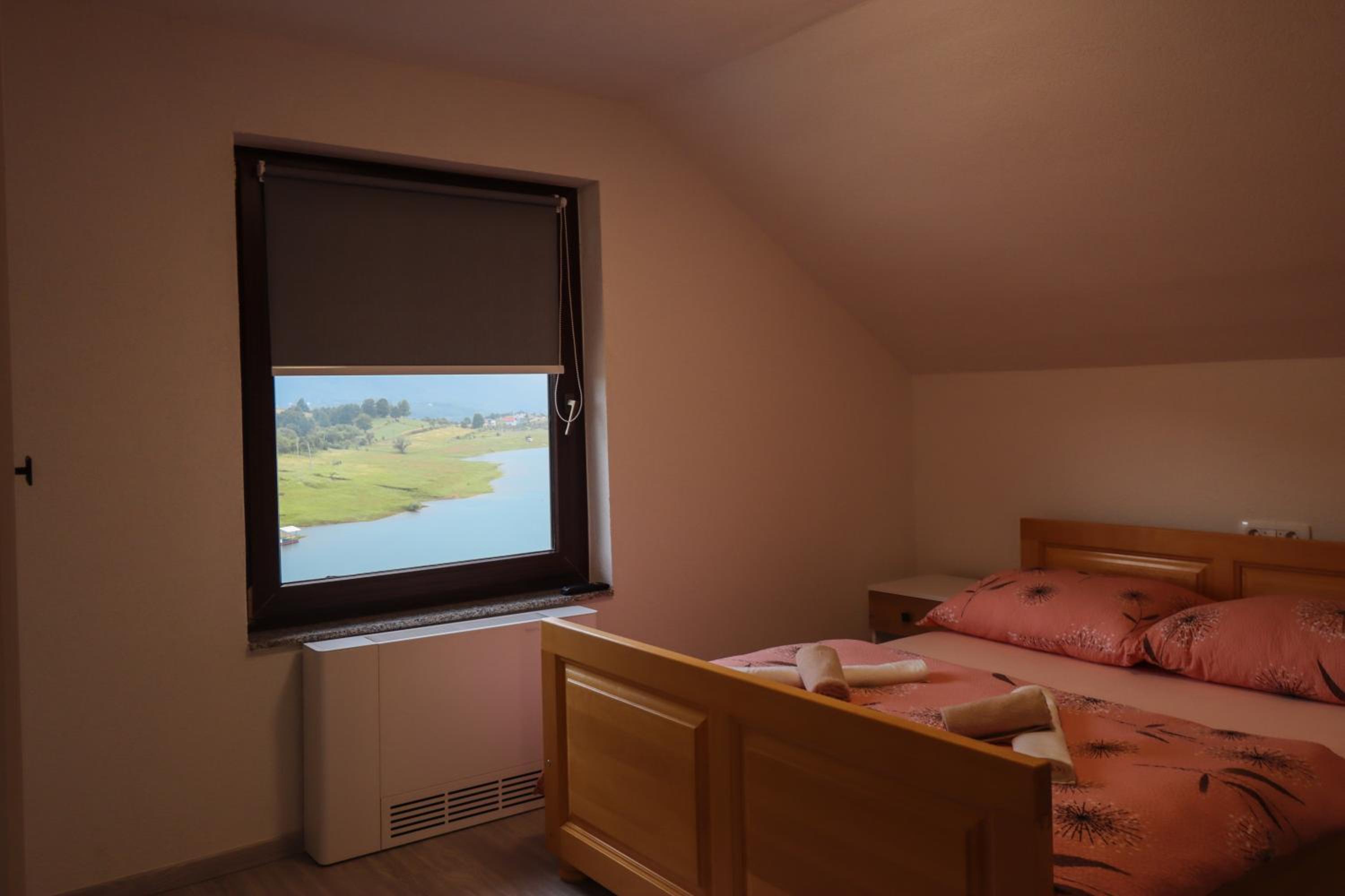 Tadic apartments and rooms by the shore of Rama Lake