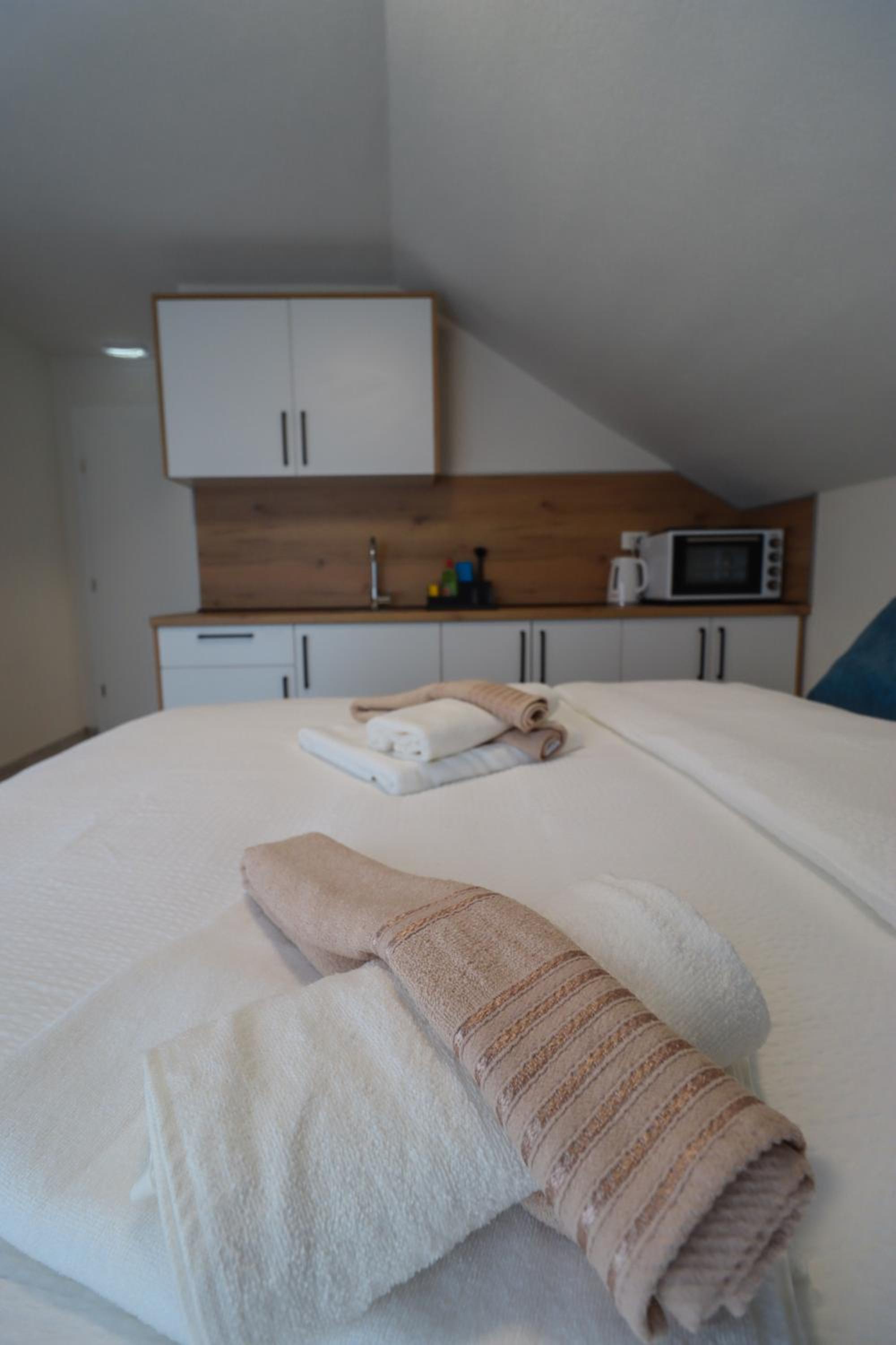Tadic apartments and rooms by the shore of Rama Lake