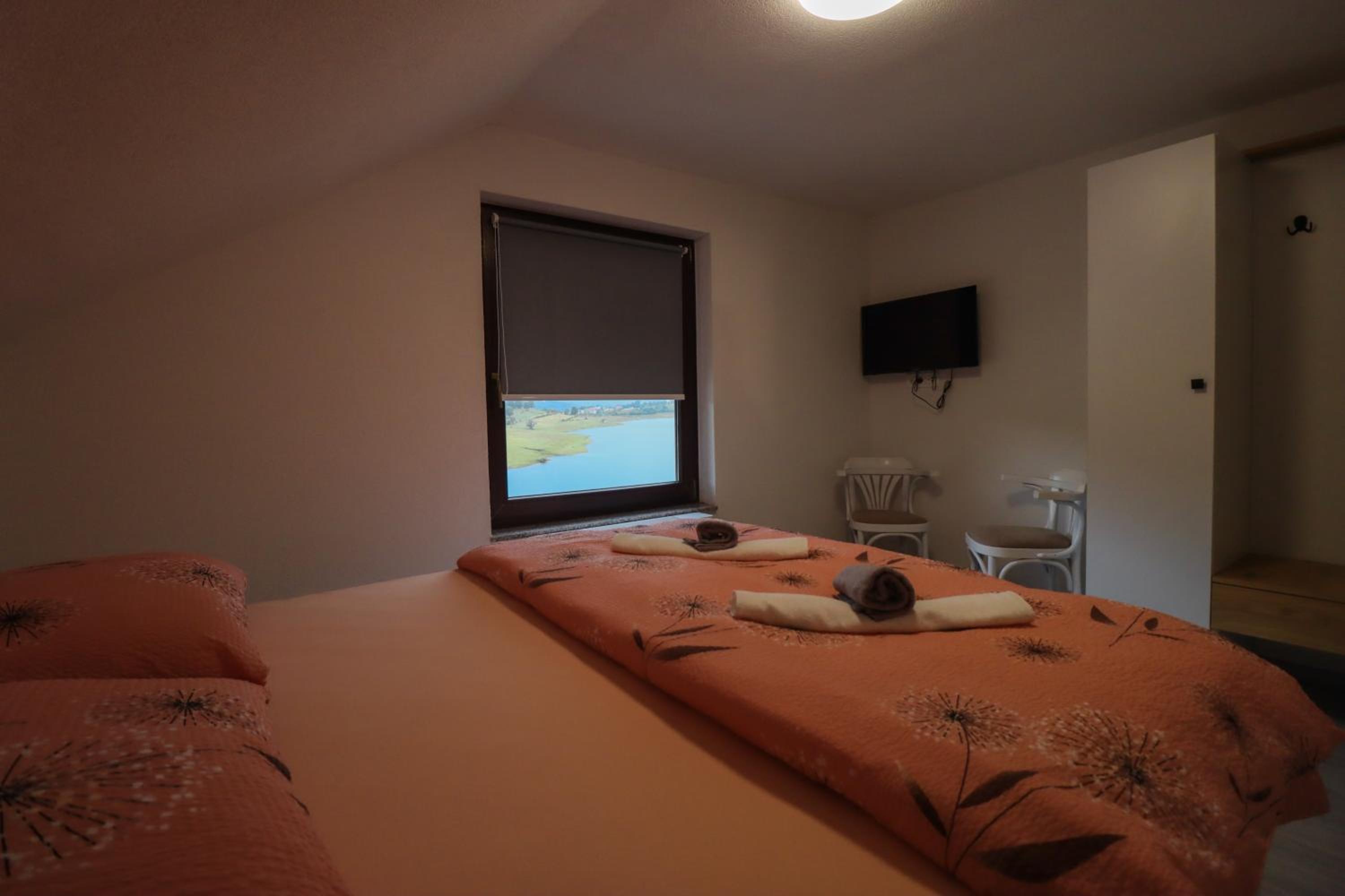 Tadic apartments and rooms by the shore of Rama Lake