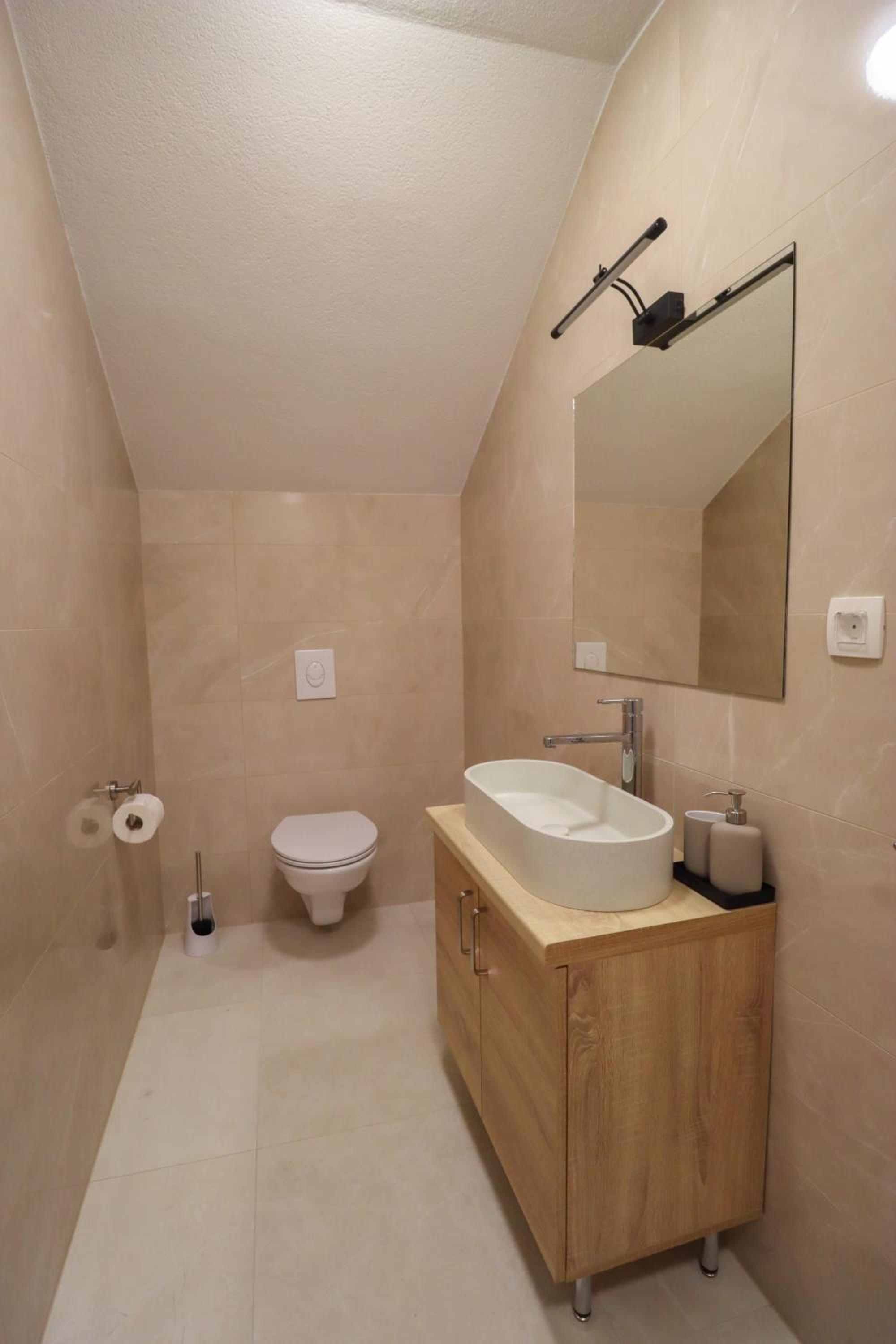 Tadic apartments and rooms by the shore of Rama Lake