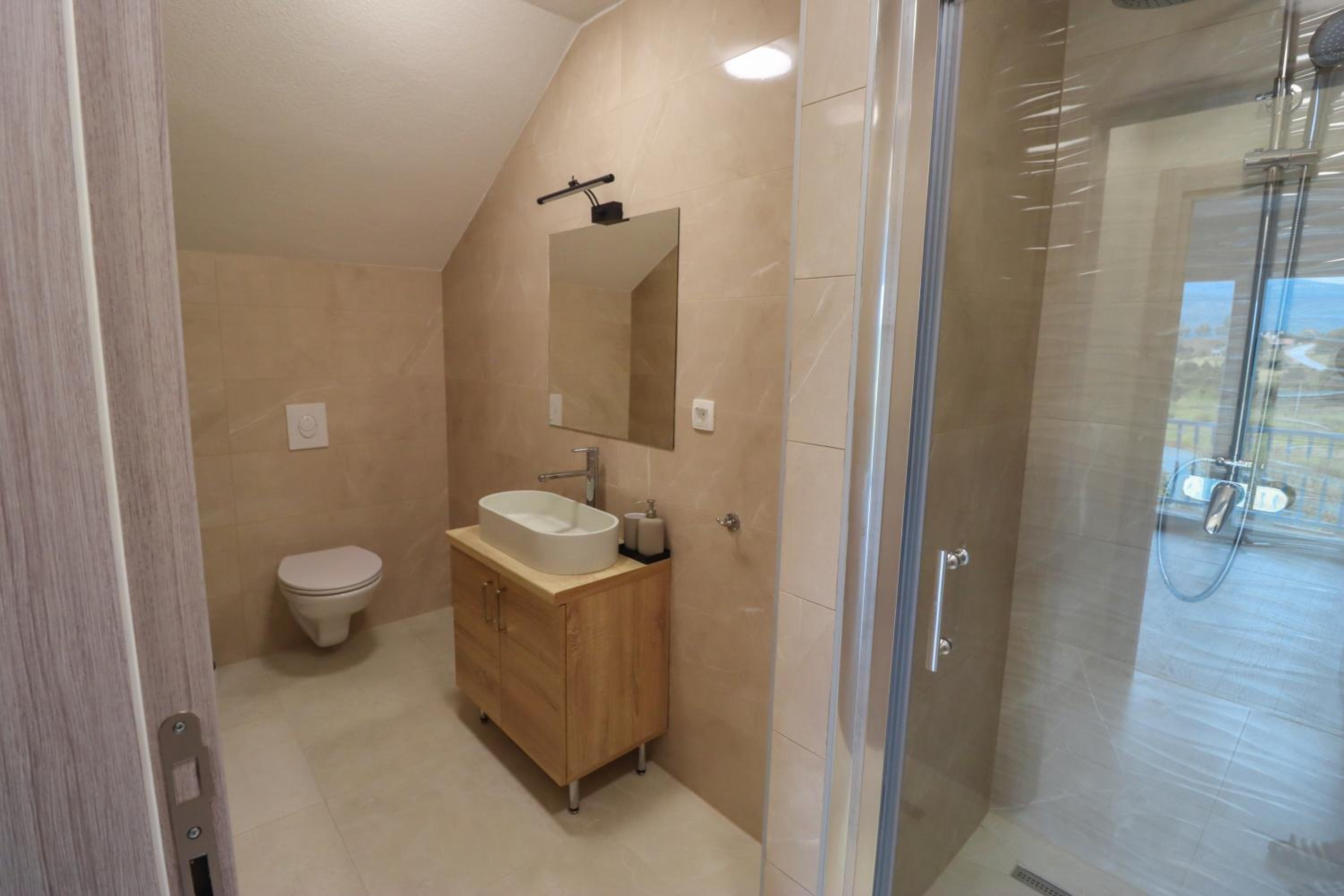 Tadic apartments and rooms by the shore of Rama Lake