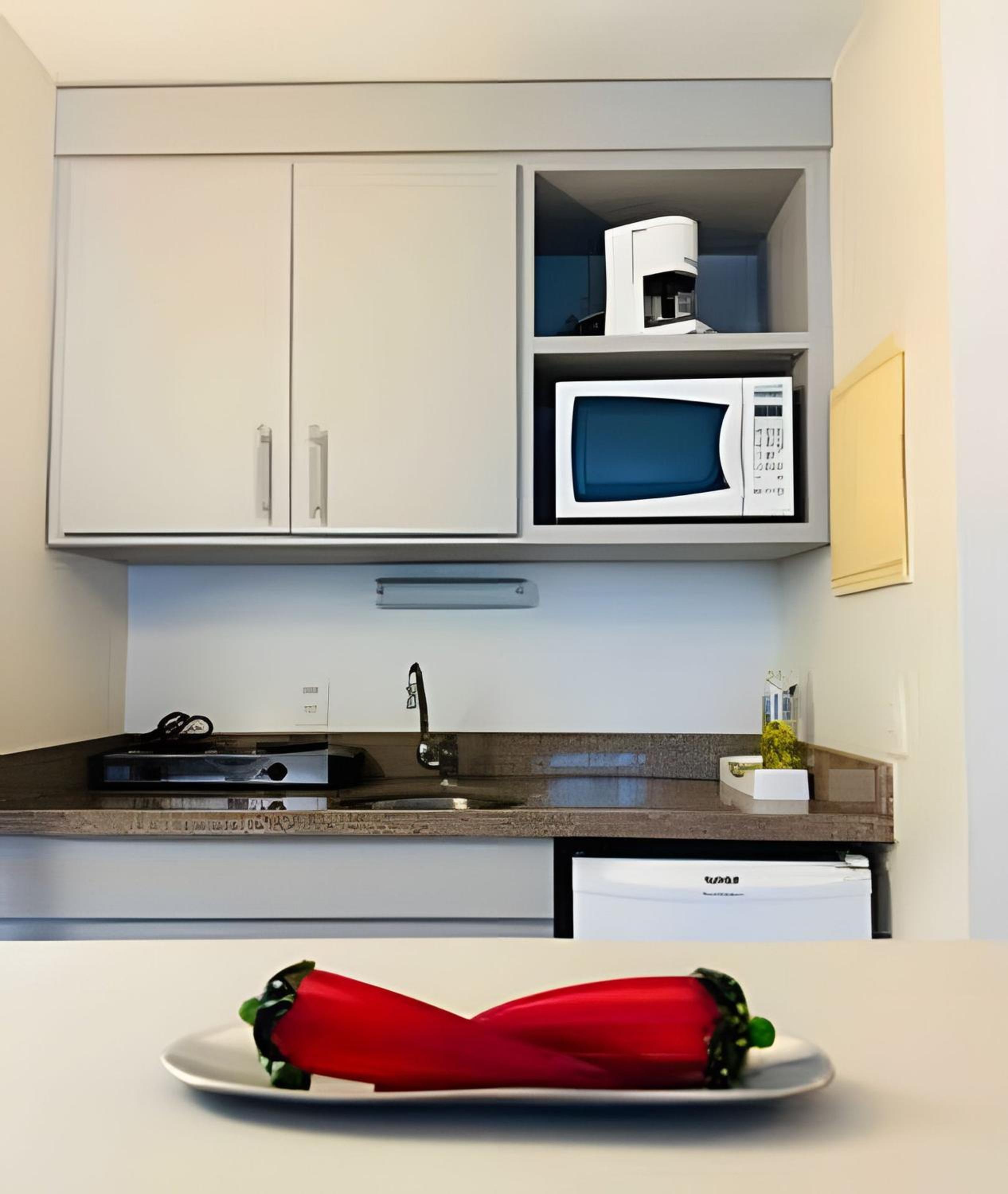 Staybridge Condomínio Flats
