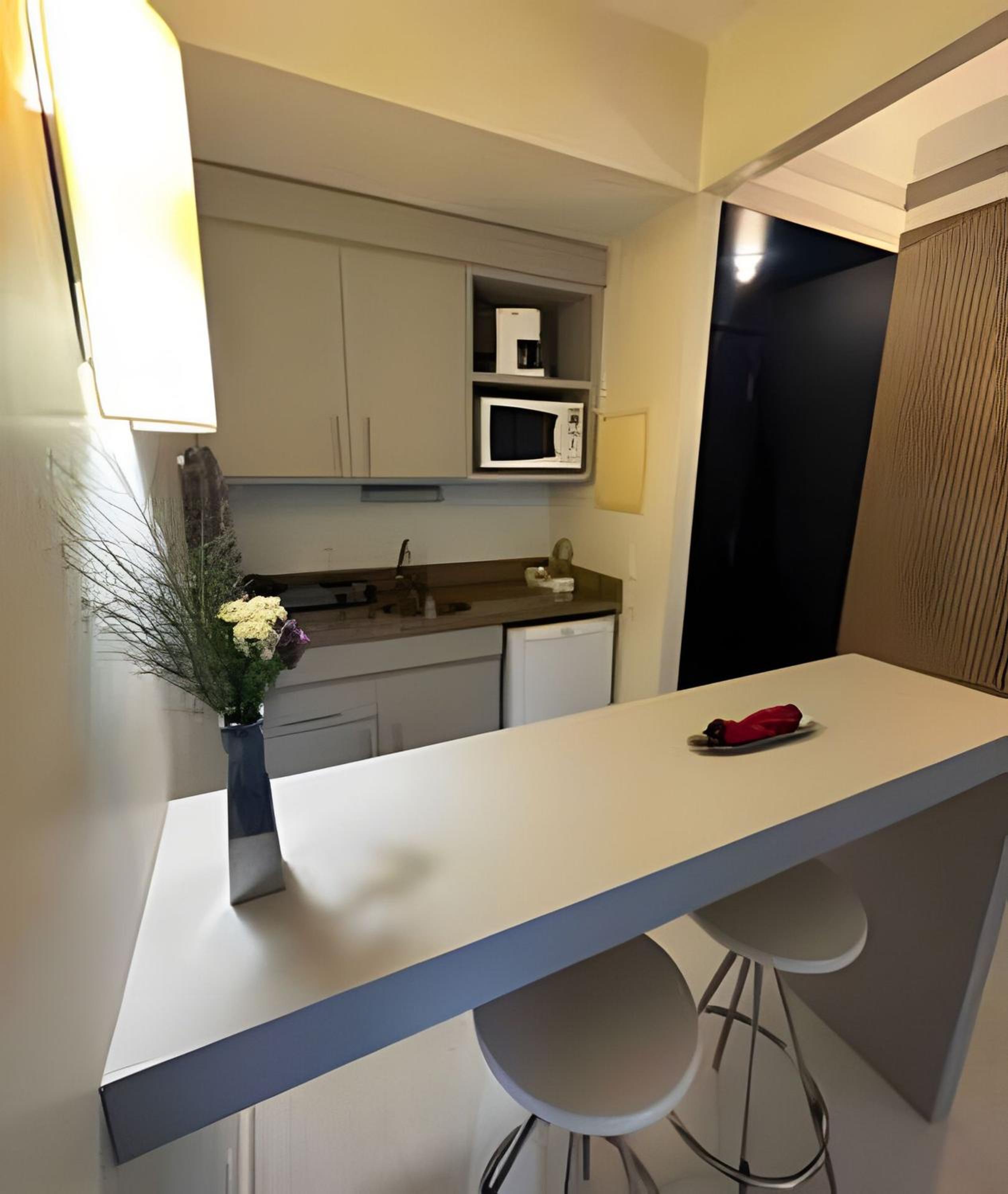 Staybridge Condomínio Flats