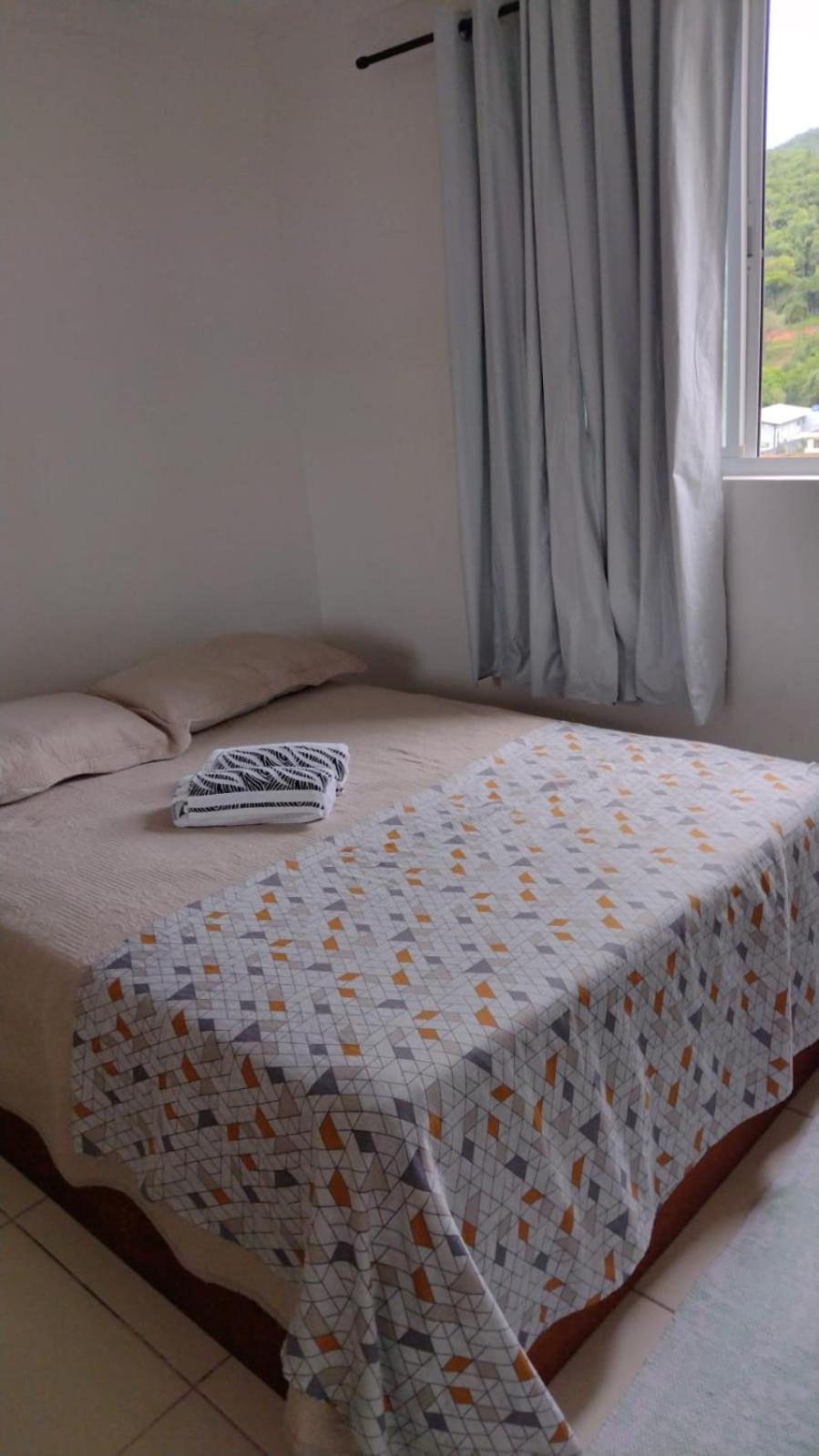 Apartamento com 2 quartos e garagem privativa