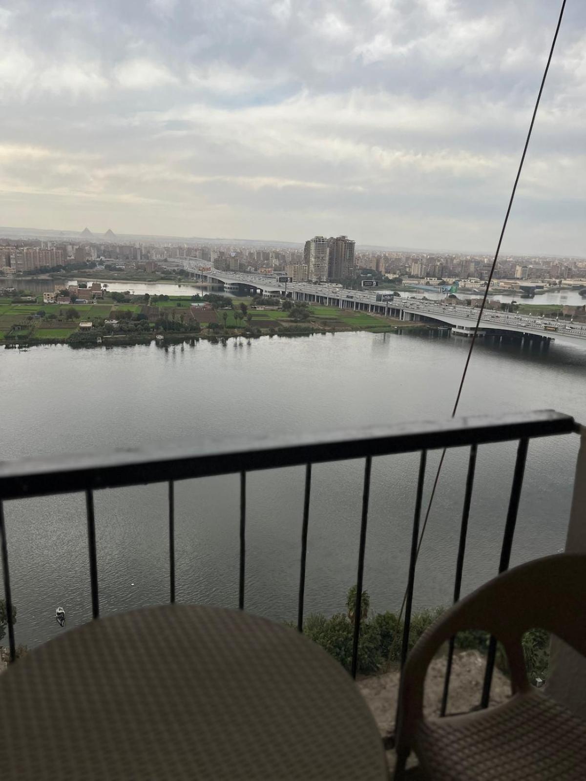 Maadi Nile and pyramids view