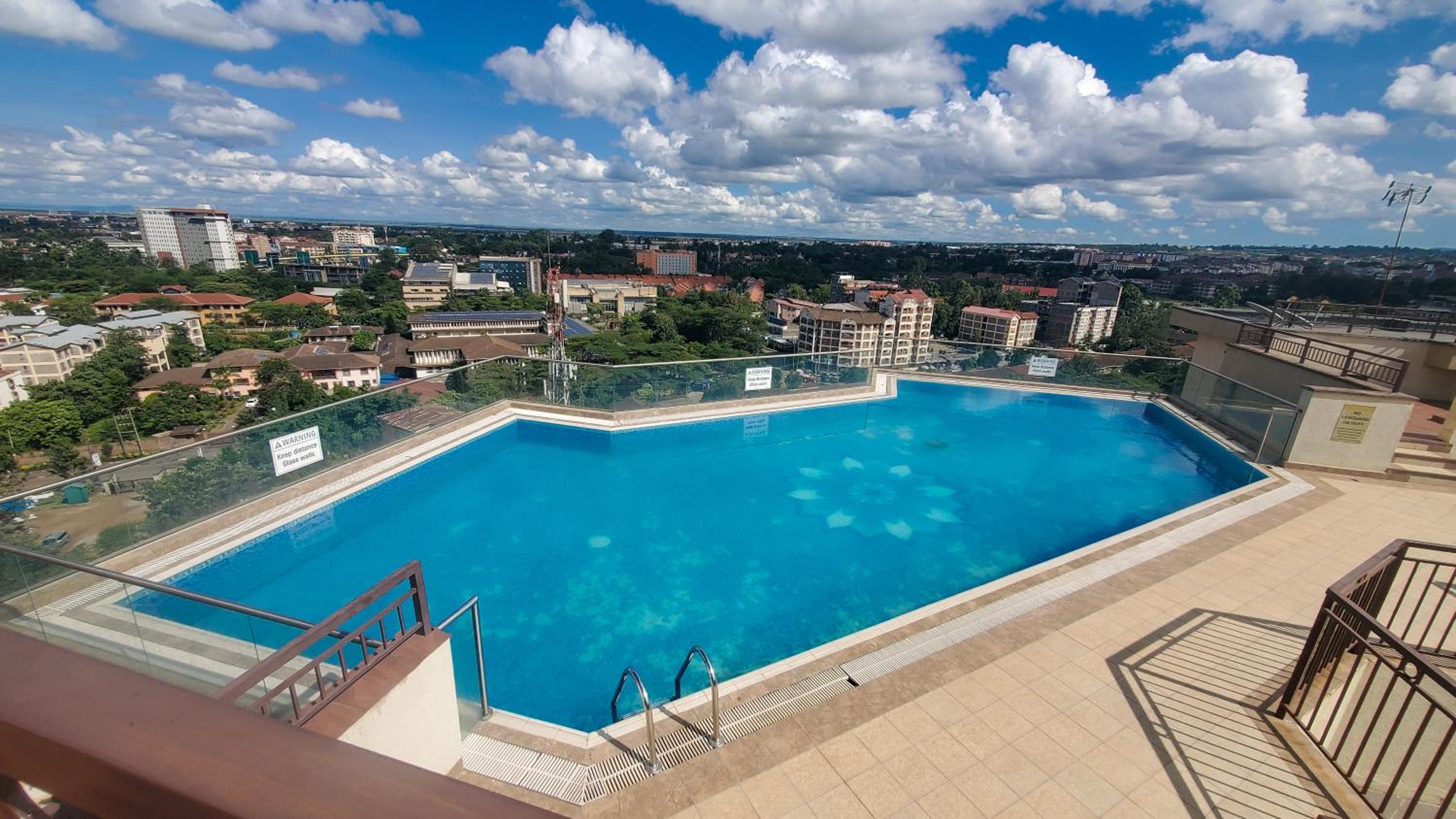 Serenity Retreat - 2 Bed Apartment with Pool & Gym view 4