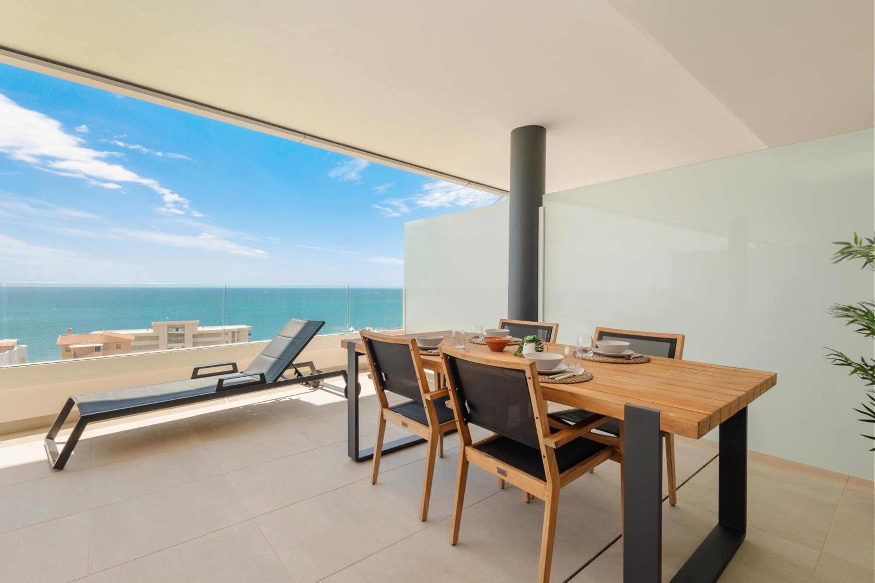 Modern apartment with a large private terrace, pool, sauna, gym, and sea views in Fuengirola