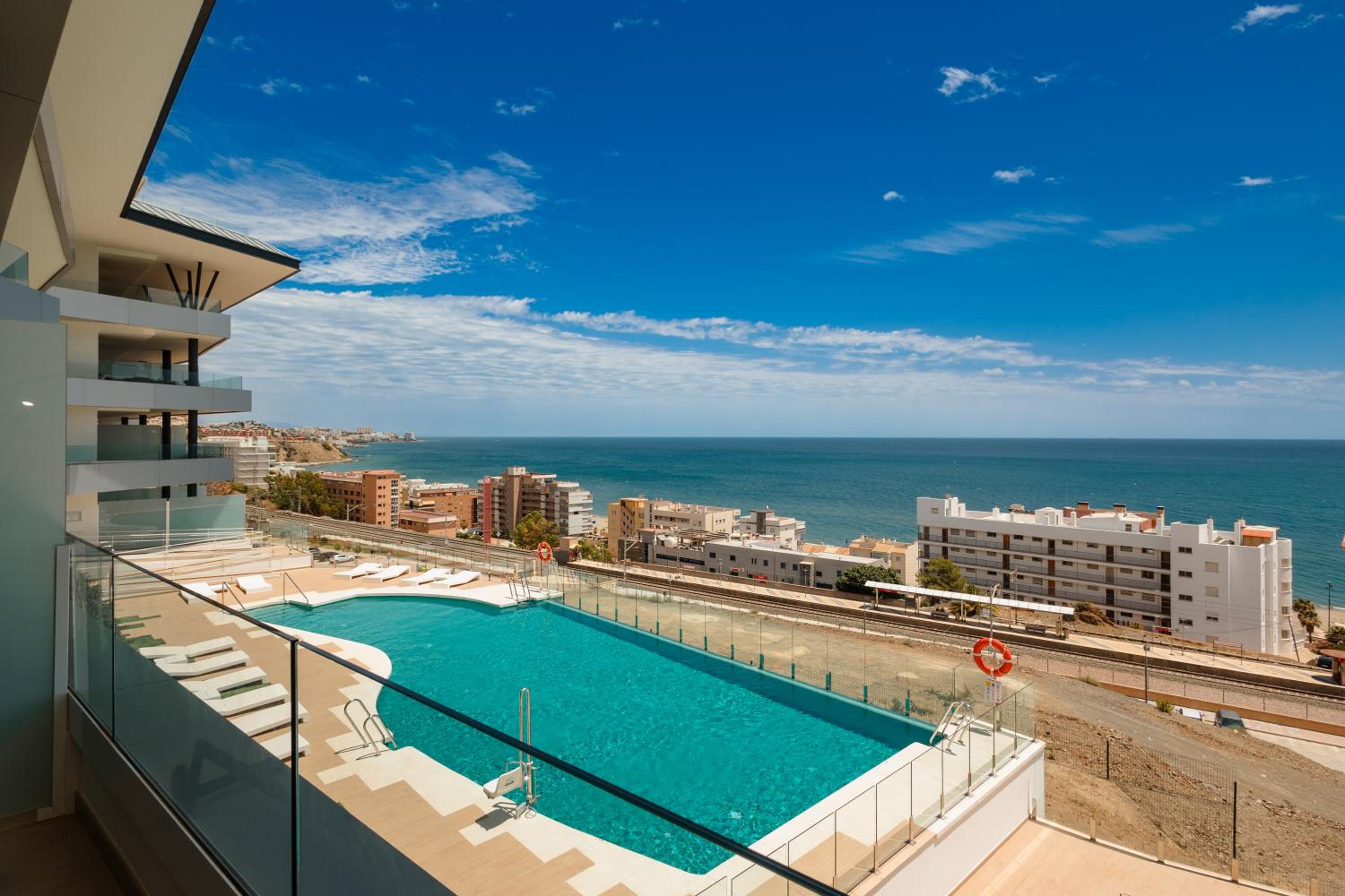 Modern apartment with a large private terrace, pool, sauna, gym, and sea views in Fuengirola