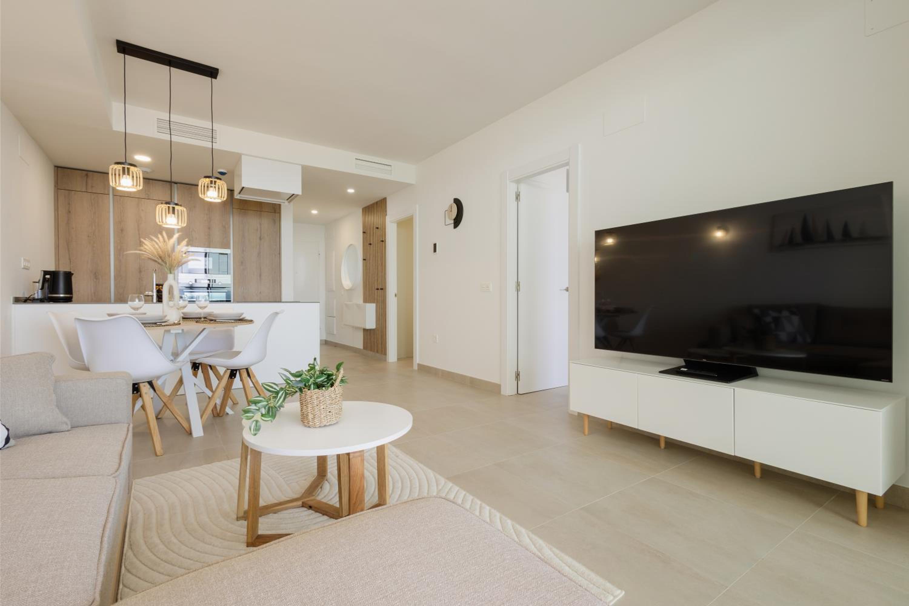 Modern apartment with a large private terrace, pool, sauna, gym, and sea views in Fuengirola