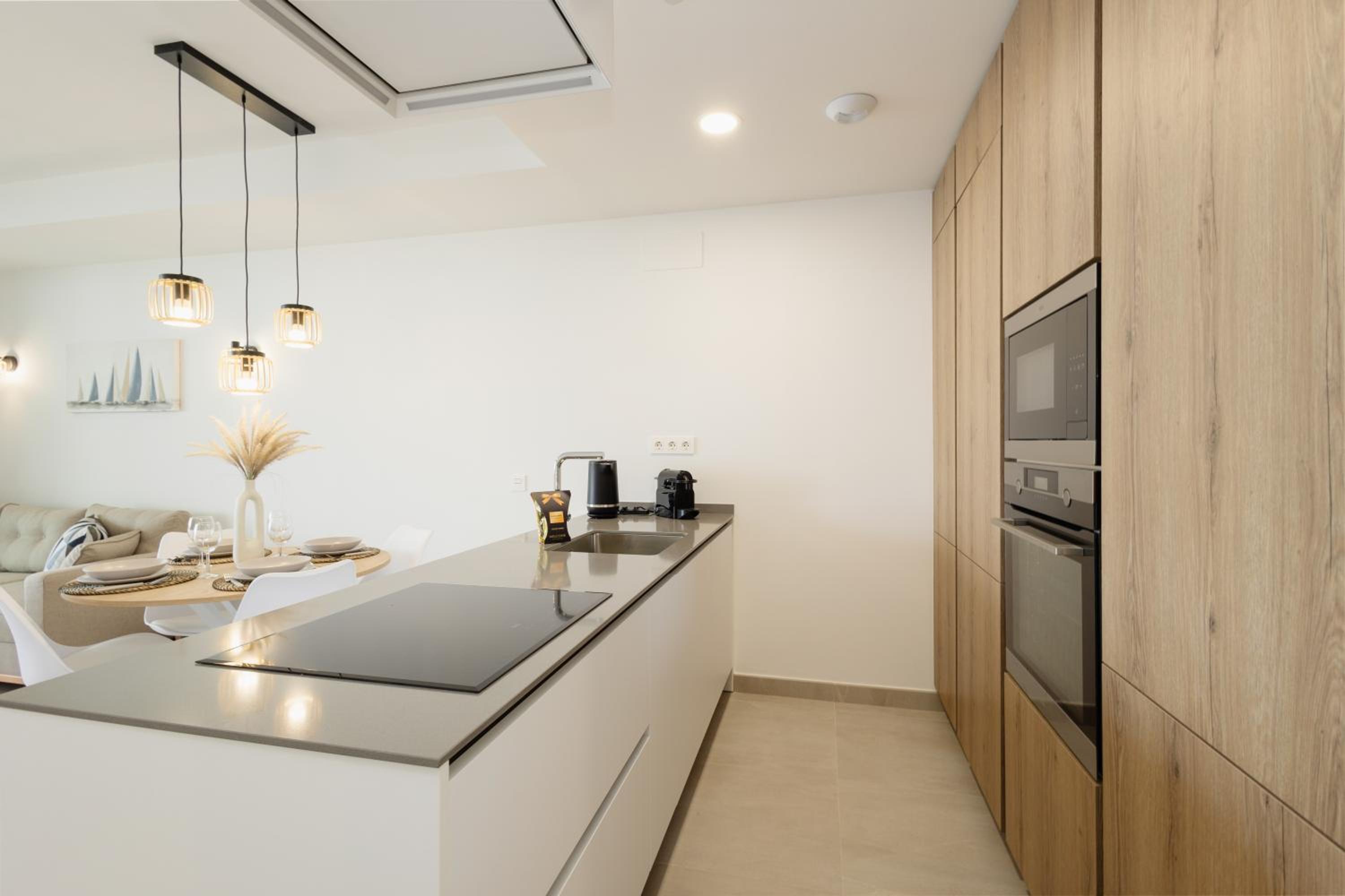 Modern apartment with a large private terrace, pool, sauna, gym, and sea views in Fuengirola