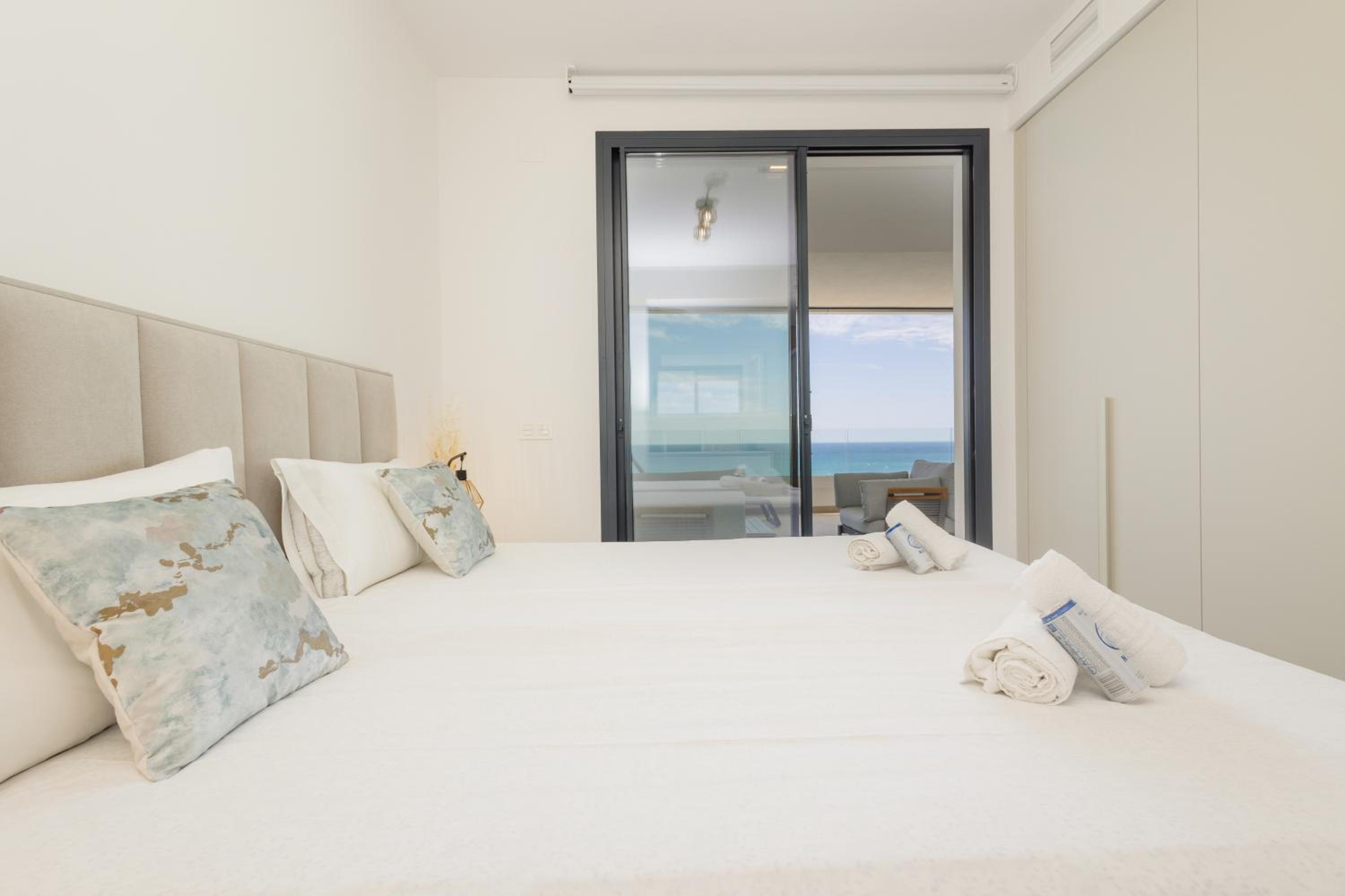 Modern apartment with a large private terrace, pool, sauna, gym, and sea views in Fuengirola