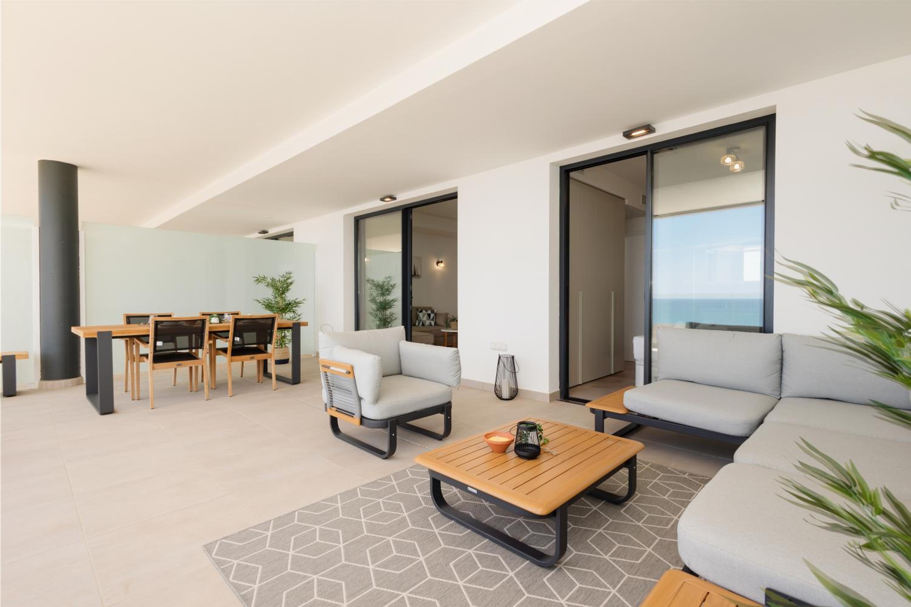 Modern apartment with a large private terrace, pool, sauna, gym, and sea views in Fuengirola