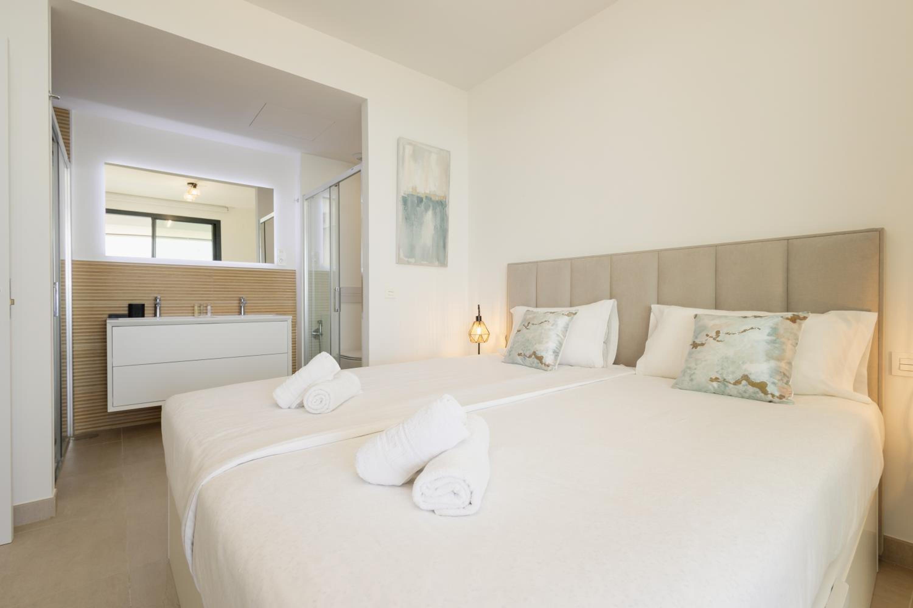 Modern apartment with a large private terrace, pool, sauna, gym, and sea views in Fuengirola