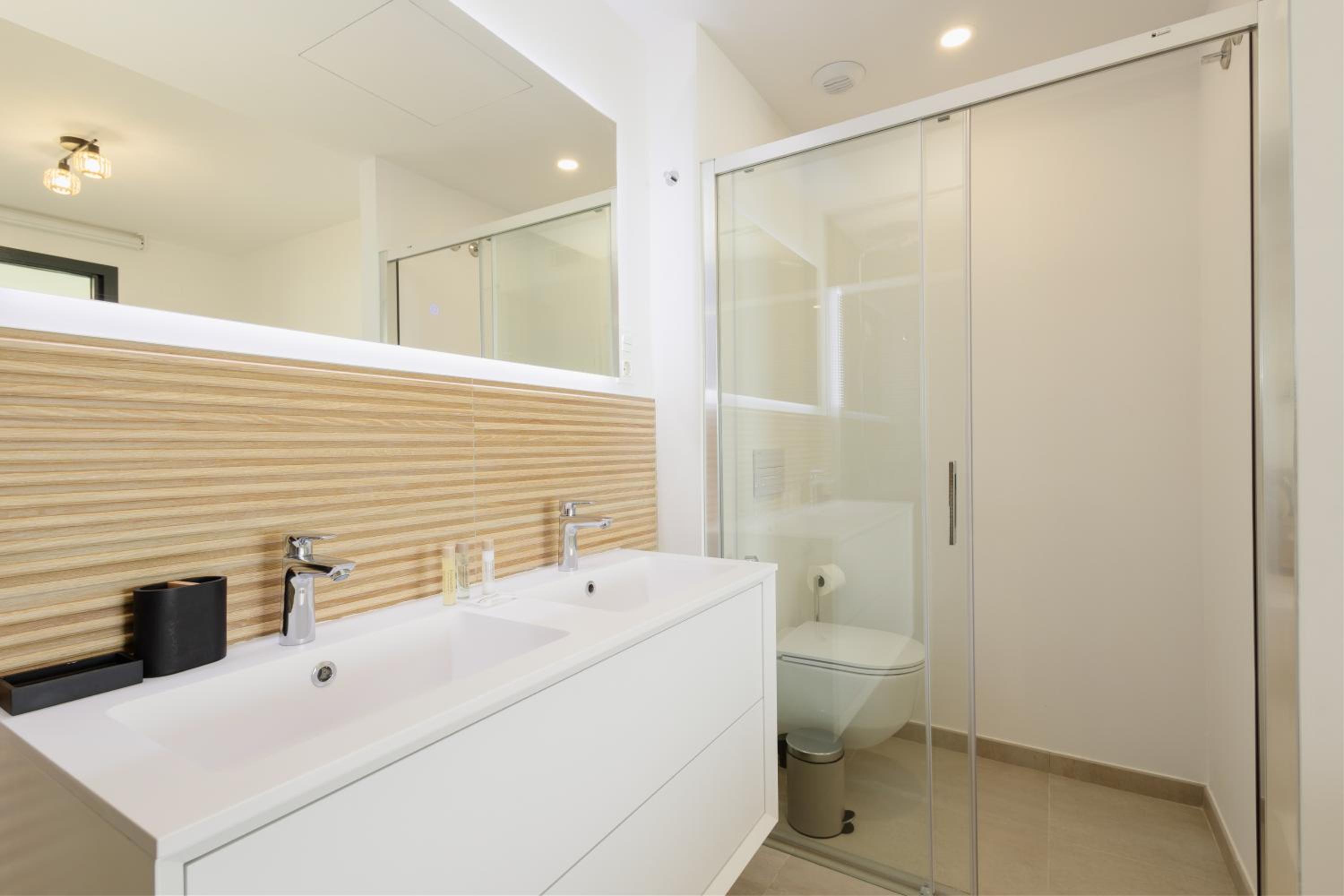 Modern apartment with a large private terrace, pool, sauna, gym, and sea views in Fuengirola
