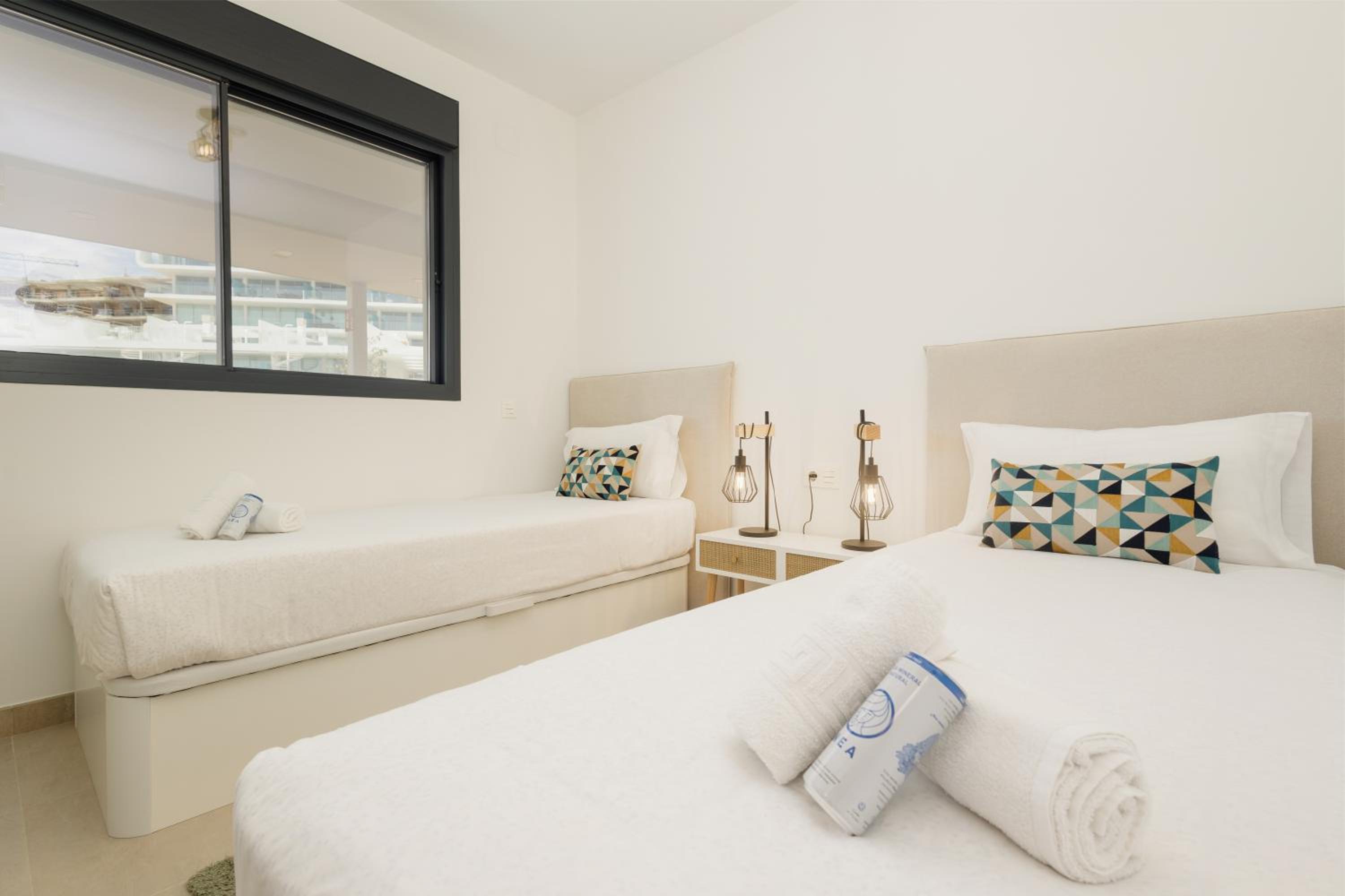 Modern apartment with a large private terrace, pool, sauna, gym, and sea views in Fuengirola