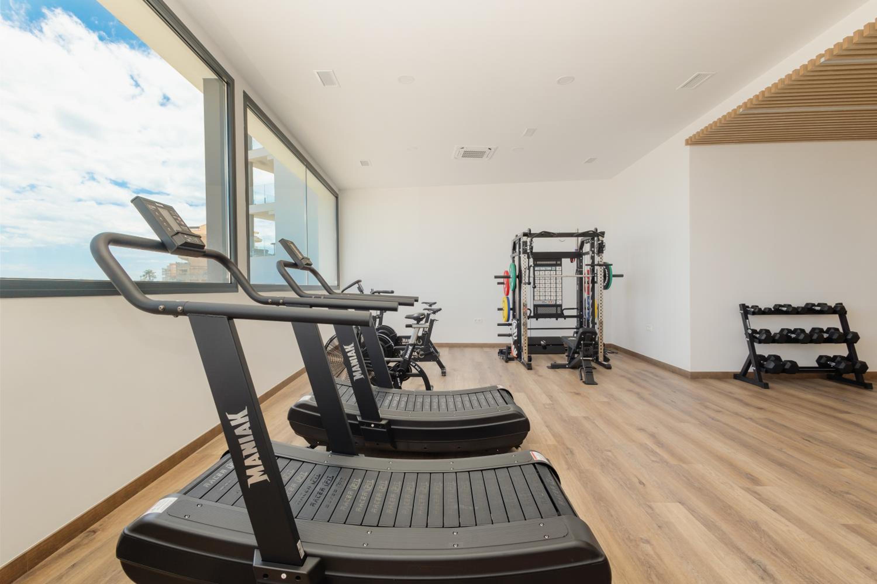 Modern apartment with a large private terrace, pool, sauna, gym, and sea views in Fuengirola