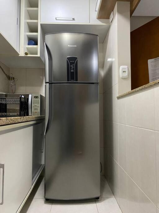 TOP DA PRAIA - 2qts, ar cond, WIFI, cozinha, garagem , completo