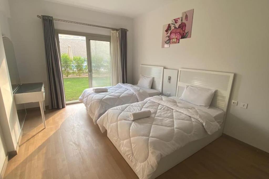 Carrara White 3BR APT W/Garden view and Pool