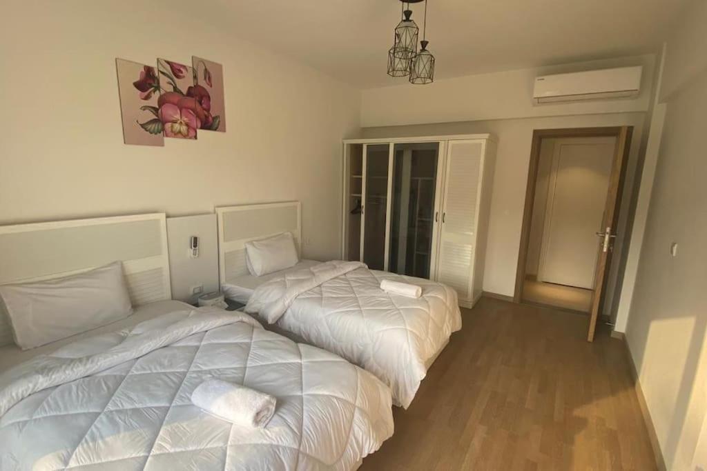 Carrara White 3BR APT W/Garden view and Pool