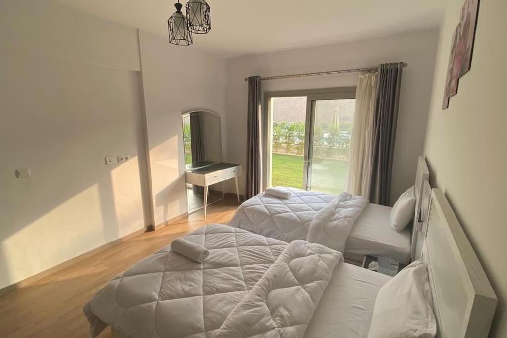 Carrara White 3BR APT W/Garden view and Pool