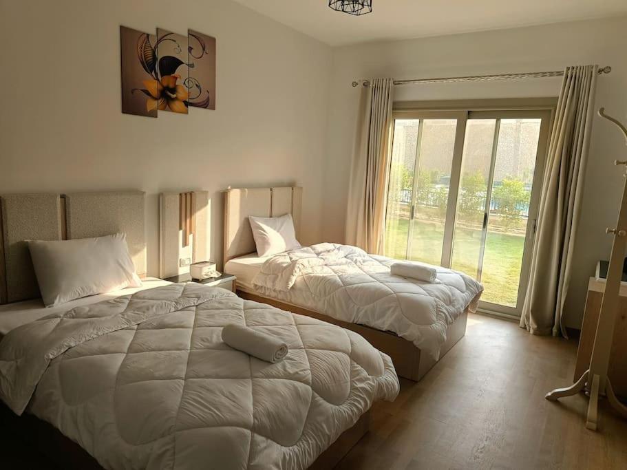 Carrara White 3BR APT W/Garden view and Pool
