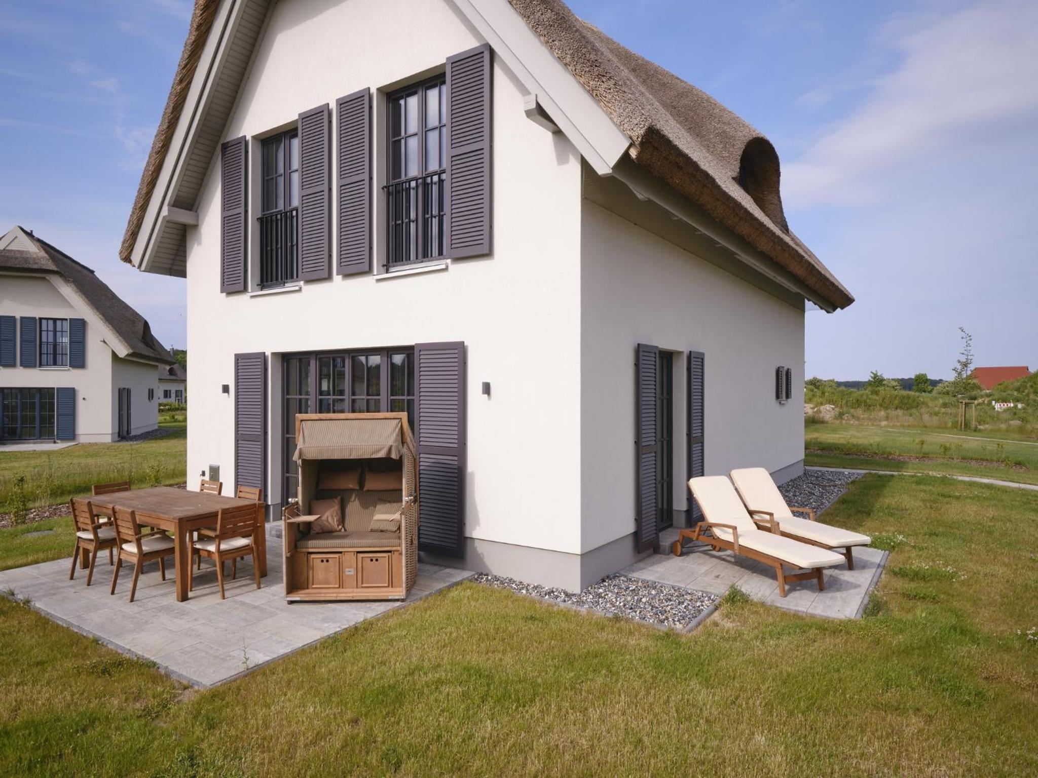 Reetland am Meer - Luxus Reetdachvilla mit 3 Schlafzimmern, Sauna und Kamin G06