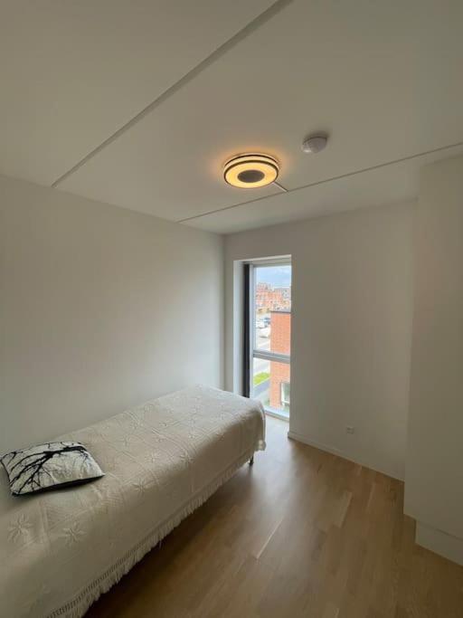 Central og rolig lejlighed med gratis parkering