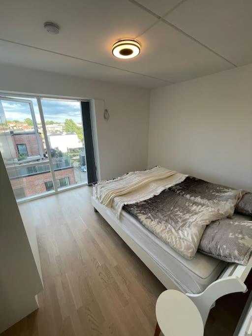 Central og rolig lejlighed med gratis parkering