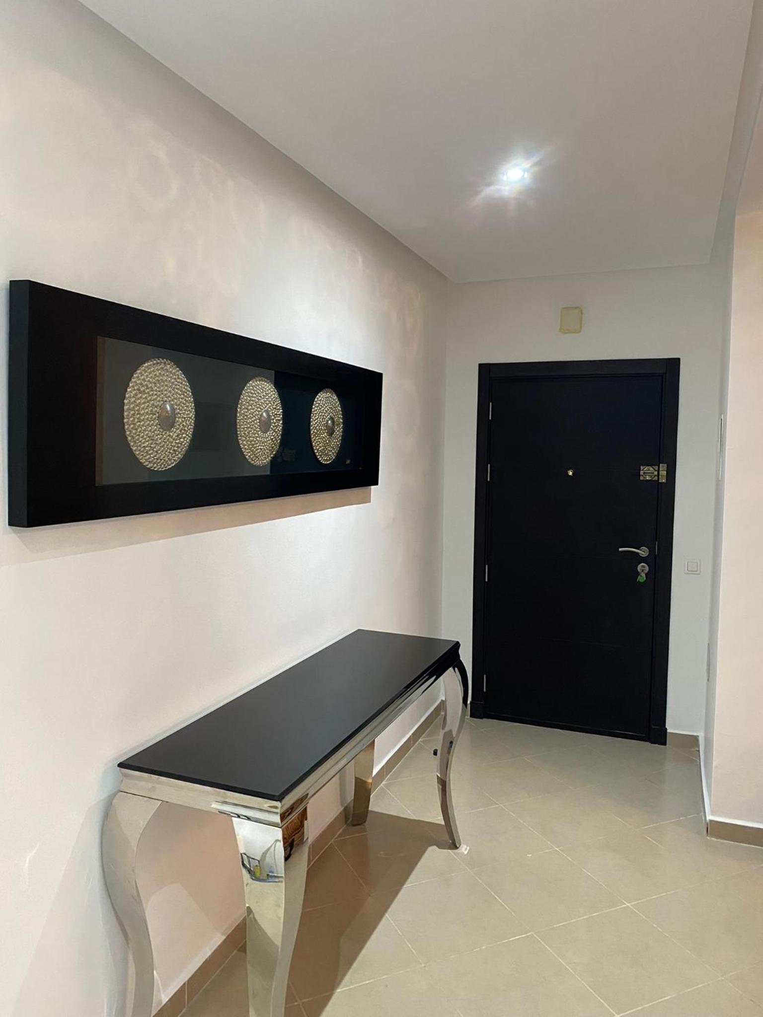 Moderne appartement met tuin