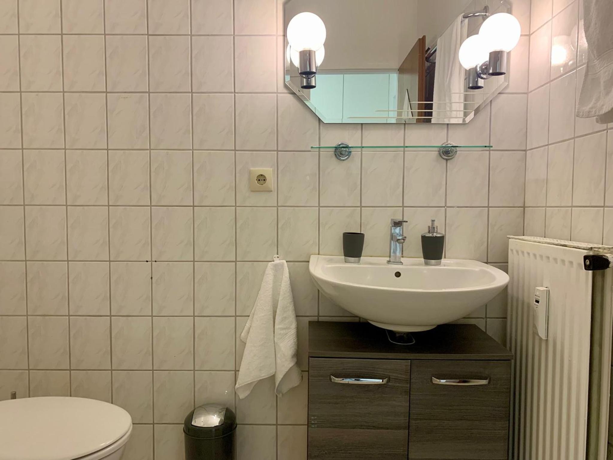 TT Living Apartment Lübeck I Souterrain Wohnung mit Terrasse I Nähe Hbf I kostenlos parken