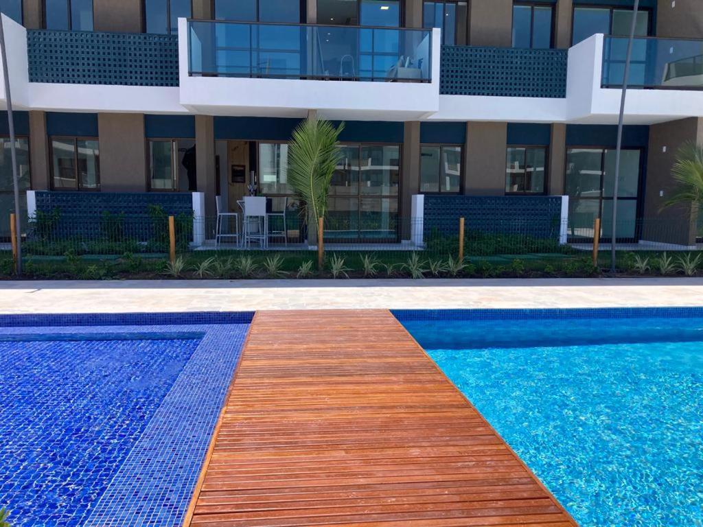 Resort em Porto de Galinhas- Flat Térreo Frente Piscinas- Muro Alto-B18
