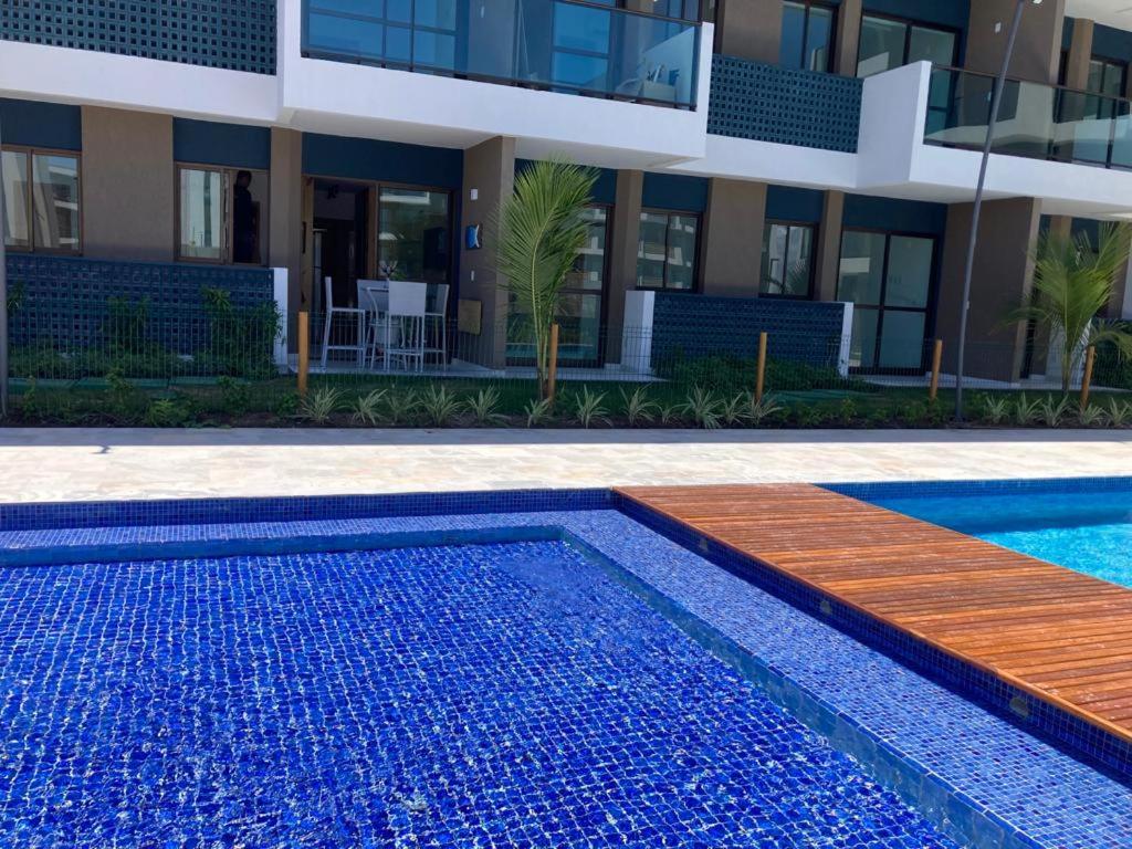 Resort em Porto de Galinhas- Flat Térreo Frente Piscinas- Muro Alto-B18
