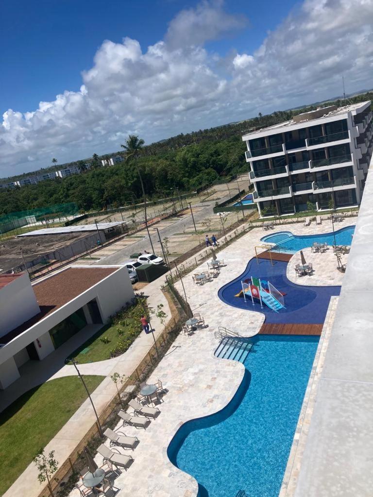 Resort em Porto de Galinhas- Flat Térreo Frente Piscinas- Muro Alto-B18
